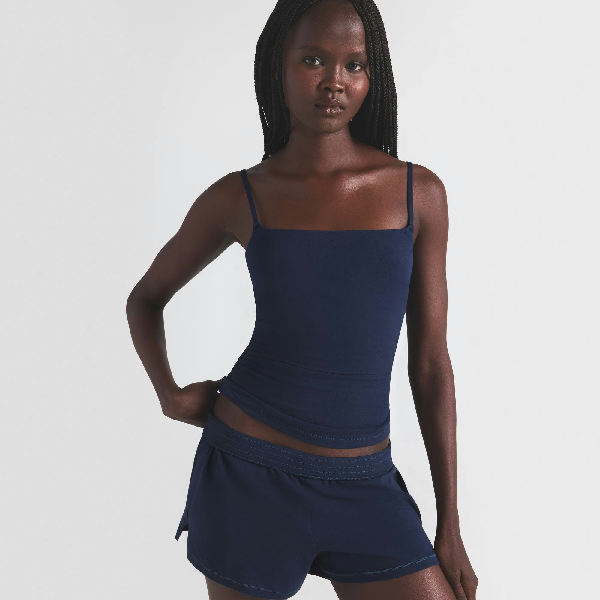 COTTON JERSEY SHORT | NAVY ON A MODEL SIDE VIEW | FOCUS: 0.0, 1.0, 0.9