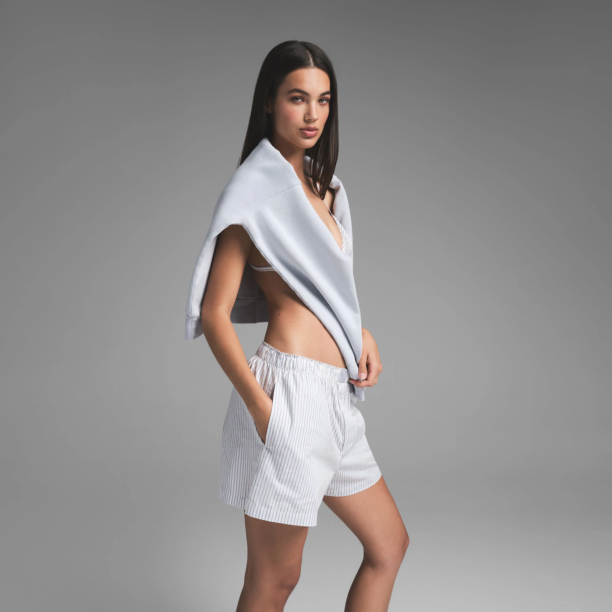 COTTON POPLIN BOXER | ZEN BLUE STRIPE ON A MODEL SIDE VIEW | FOCUS: 0.0, 1.0, 0.9