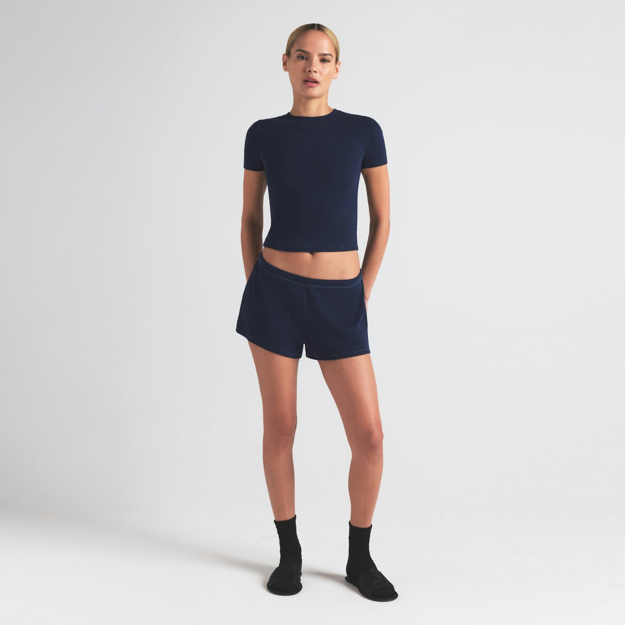 COTTON RIB LOOSE SHORT | NAVY ON A MODEL FRONT VIEW | FOCUS: 0.0, 1.0, 0.9