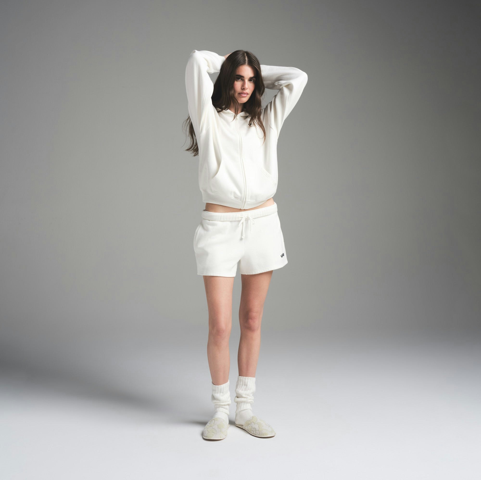COTTON FLEECE CLASSIC SHORT | MARBLE WITH GRAPHIC ON A MODEL FRONT VIEW | FOCUS: 0.0, 1.0, 0.9