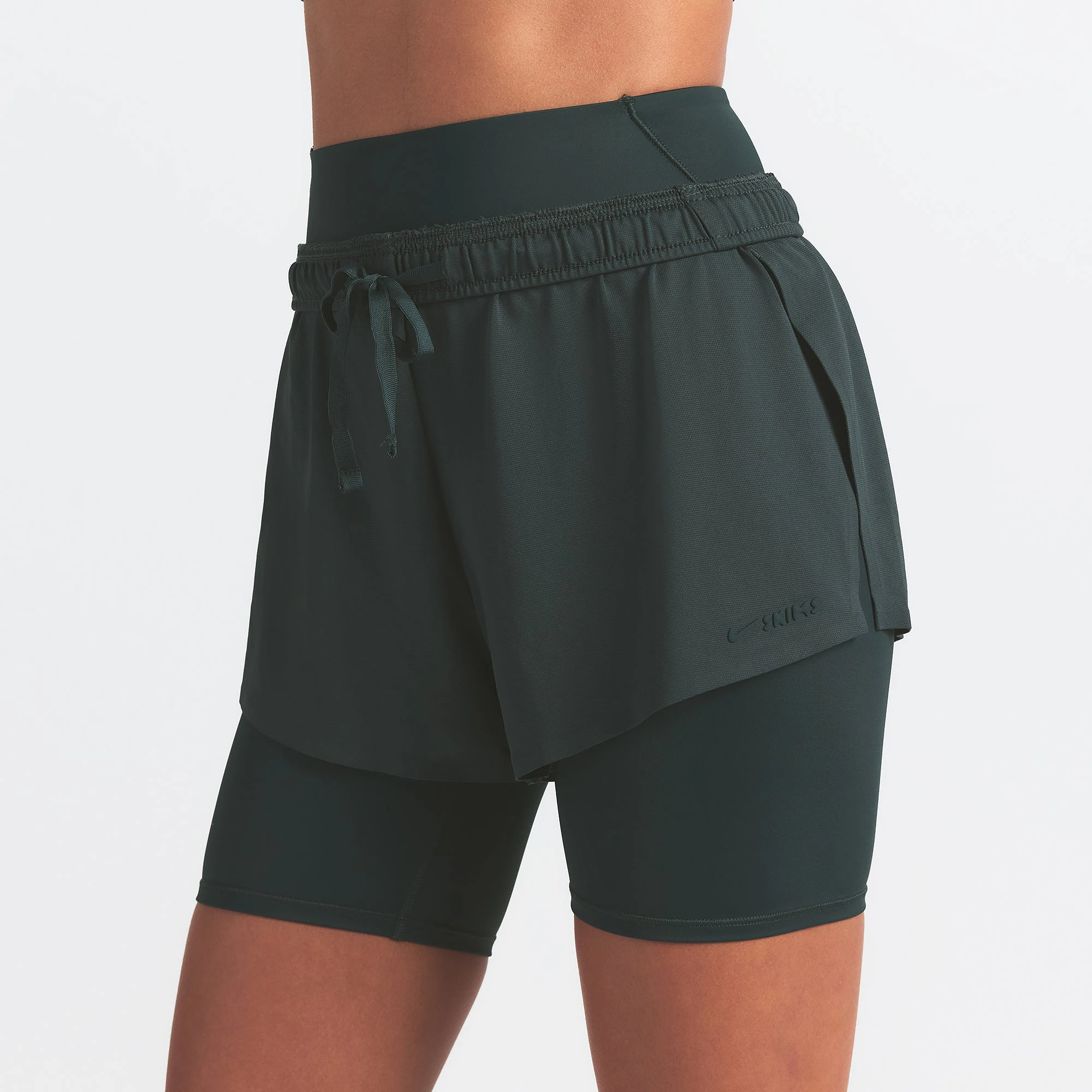 NikeSKIMS AIRY MINI SHORT | DARK TEAL ON A MODEL SIDE VIEW @ | FOCUS: 0.0, 1.0, 0.9