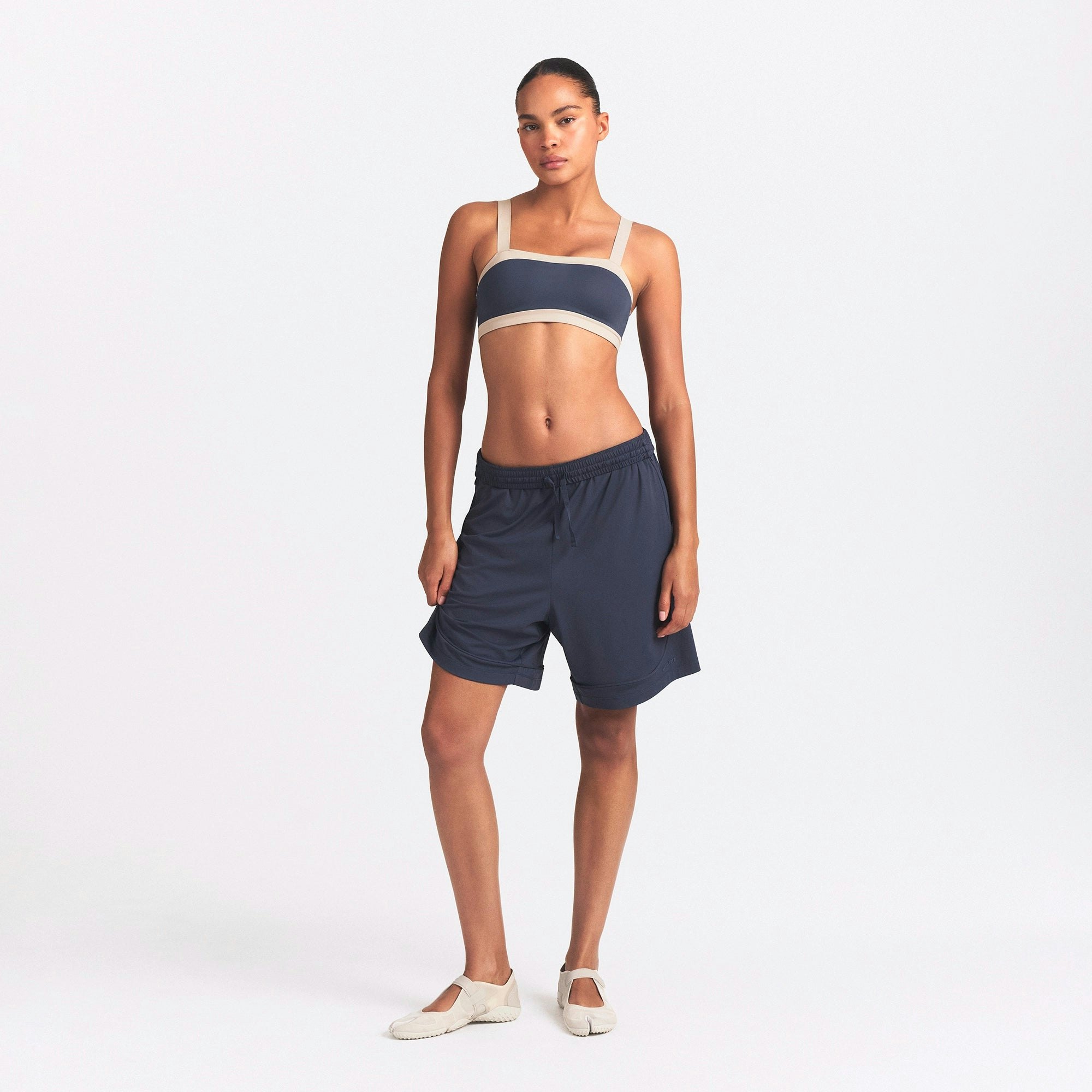 NikeSKIMS AIRY RELAXED SHORT | DEEP ROYAL ON A MODEL FRONT VIEW @ | FOCUS: 0.0, 1.0, 0.9