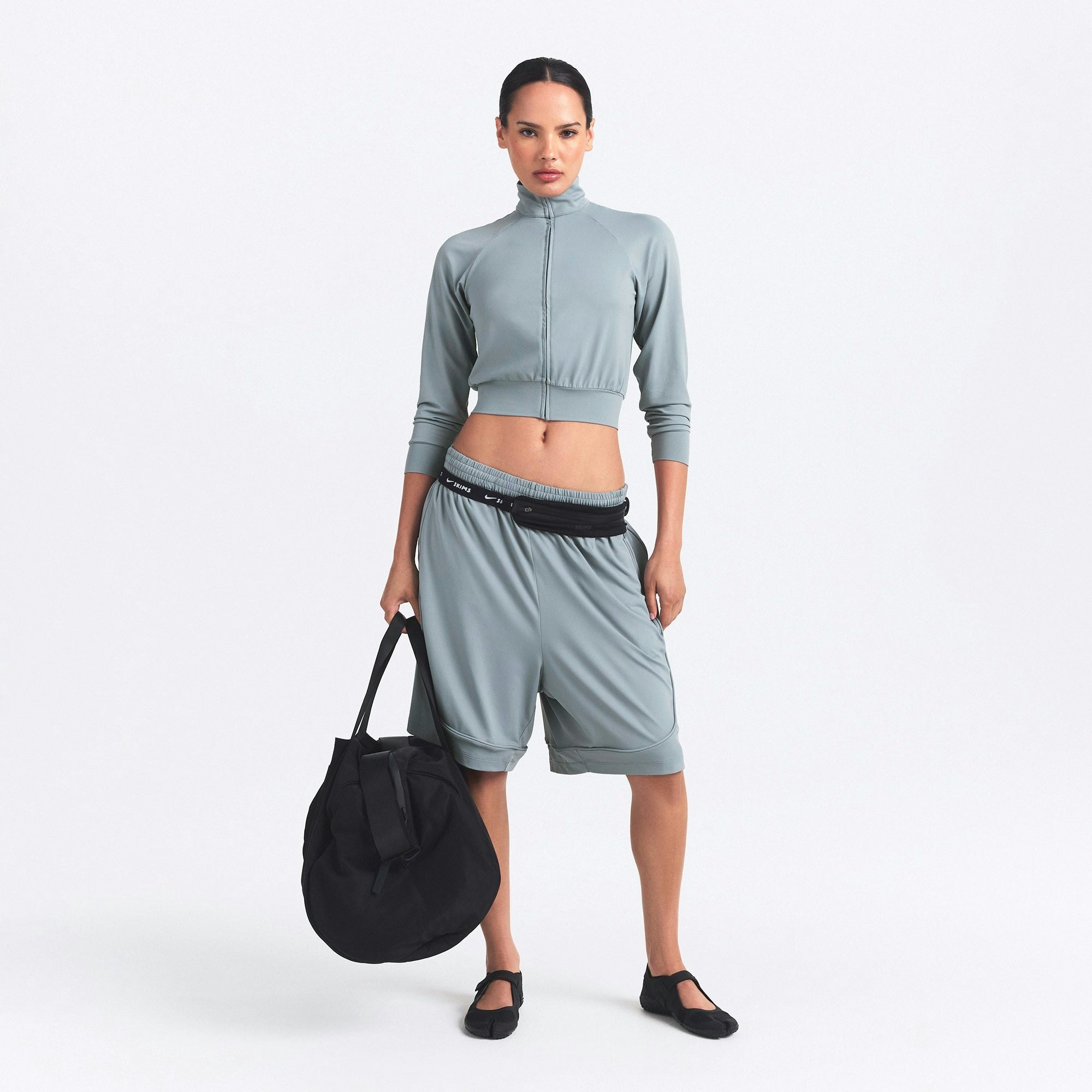 NikeSKIMS AIRY RELAXED SHORT | WASHED PACIFIC ON A MODEL FRONT VIEW @ | FOCUS: 0.0, 1.0, 0.9