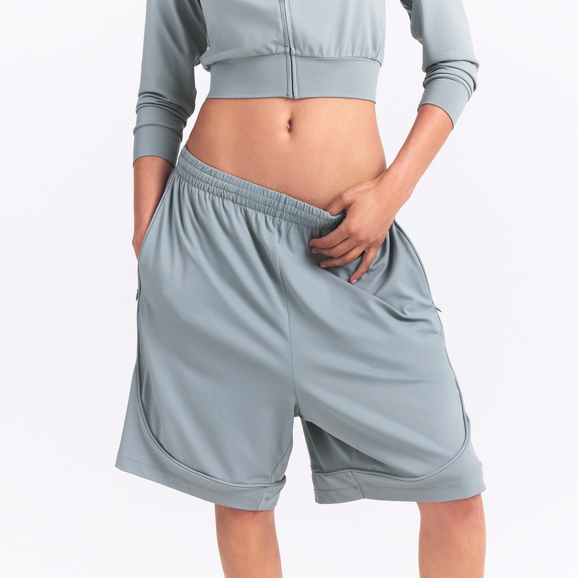 NikeSKIMS AIRY RELAXED SHORT | WASHED PACIFIC ON A MODEL SIDE VIEW @ | FOCUS: 0.0, 1.0, 0.9
