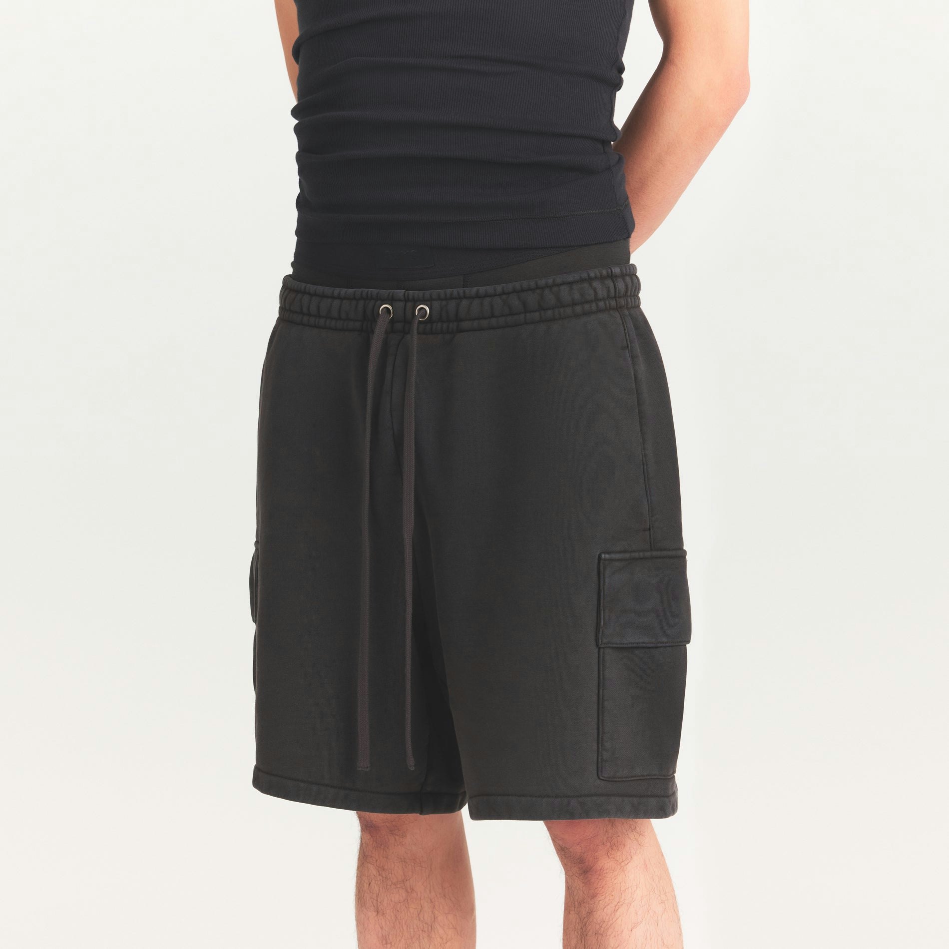HEAVYWEIGHT FLEECE MENS CARGO SHORT | WASHED ONYX ON A MODEL SIDE VIEW @ | FOCUS: 0.0, 1.0, 0.9