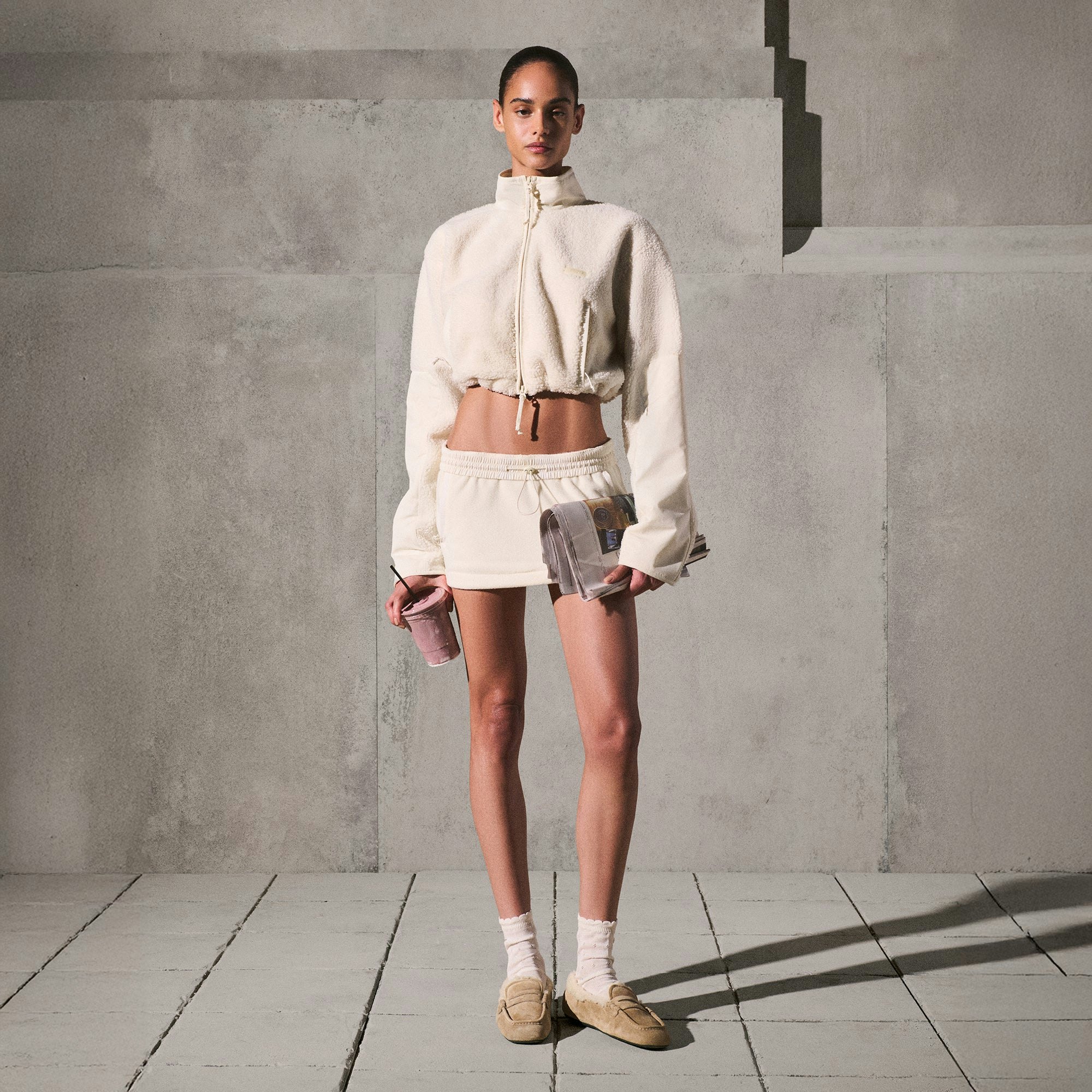 OUTDOOR FLEECE MINI SKIRT | ECRU ON A MODEL SIDE VIEW @ | FOCUS: 0.0, 1.0, 0.9