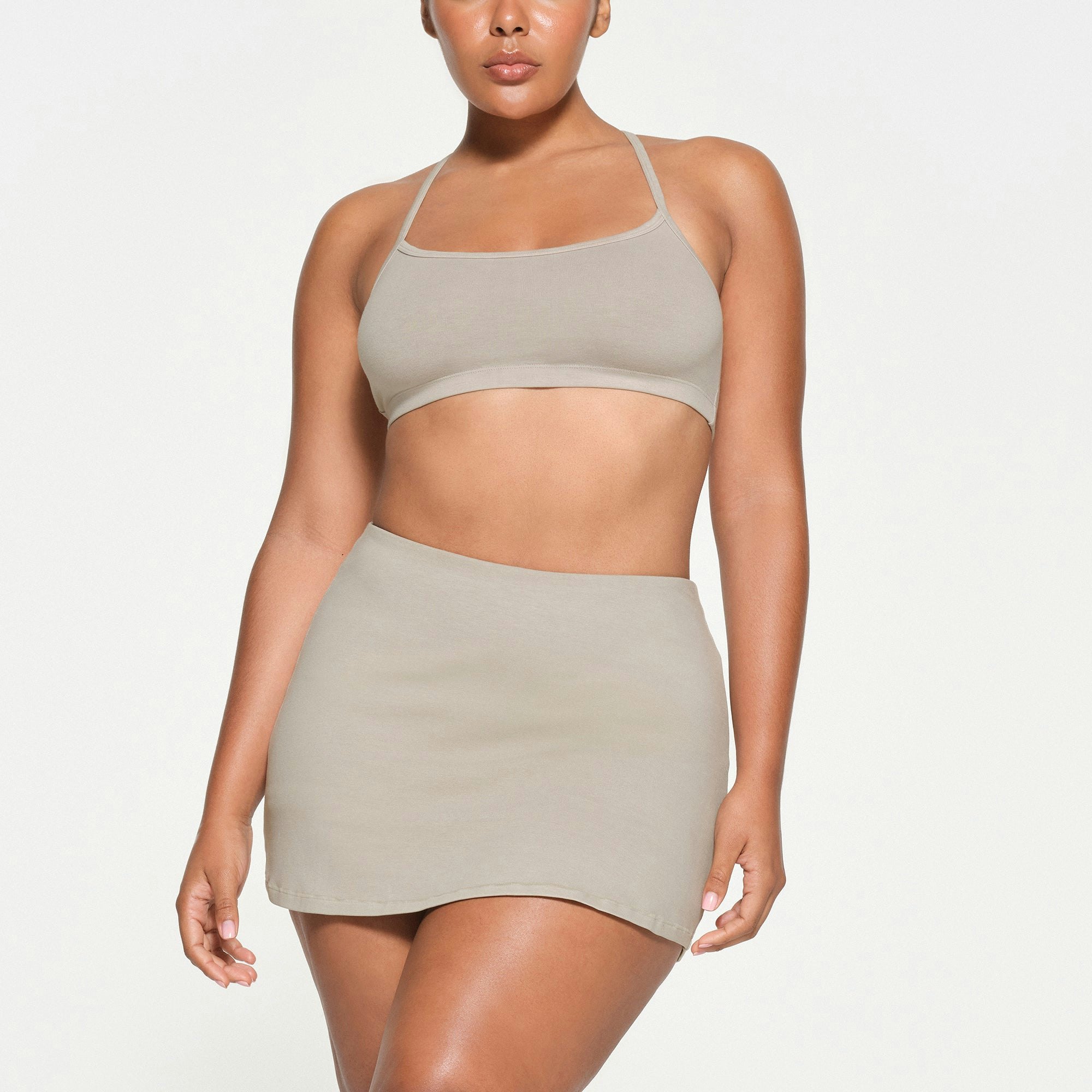 OUTDOOR SKORT | STONE ON A MODEL FRONT VIEW