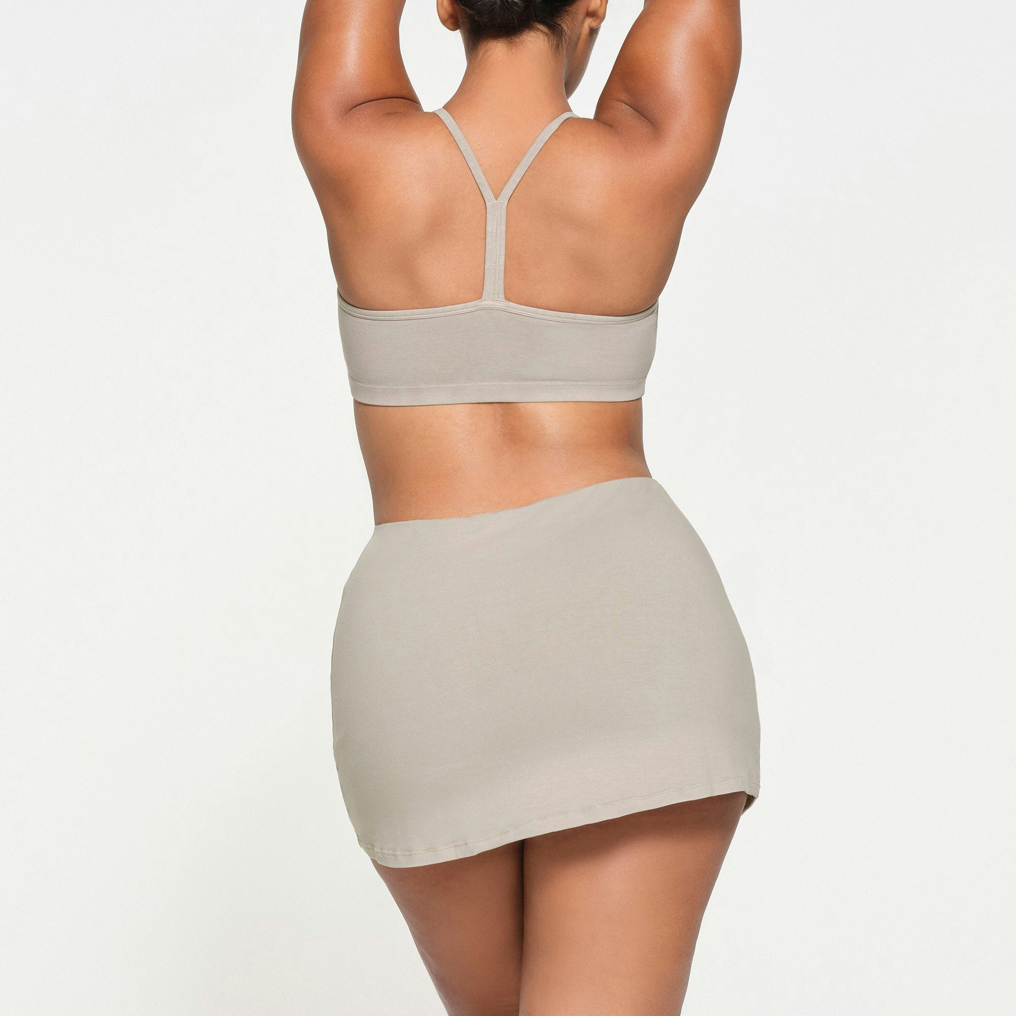 OUTDOOR SKORT | STONE ON A MODEL BACK VIEW
