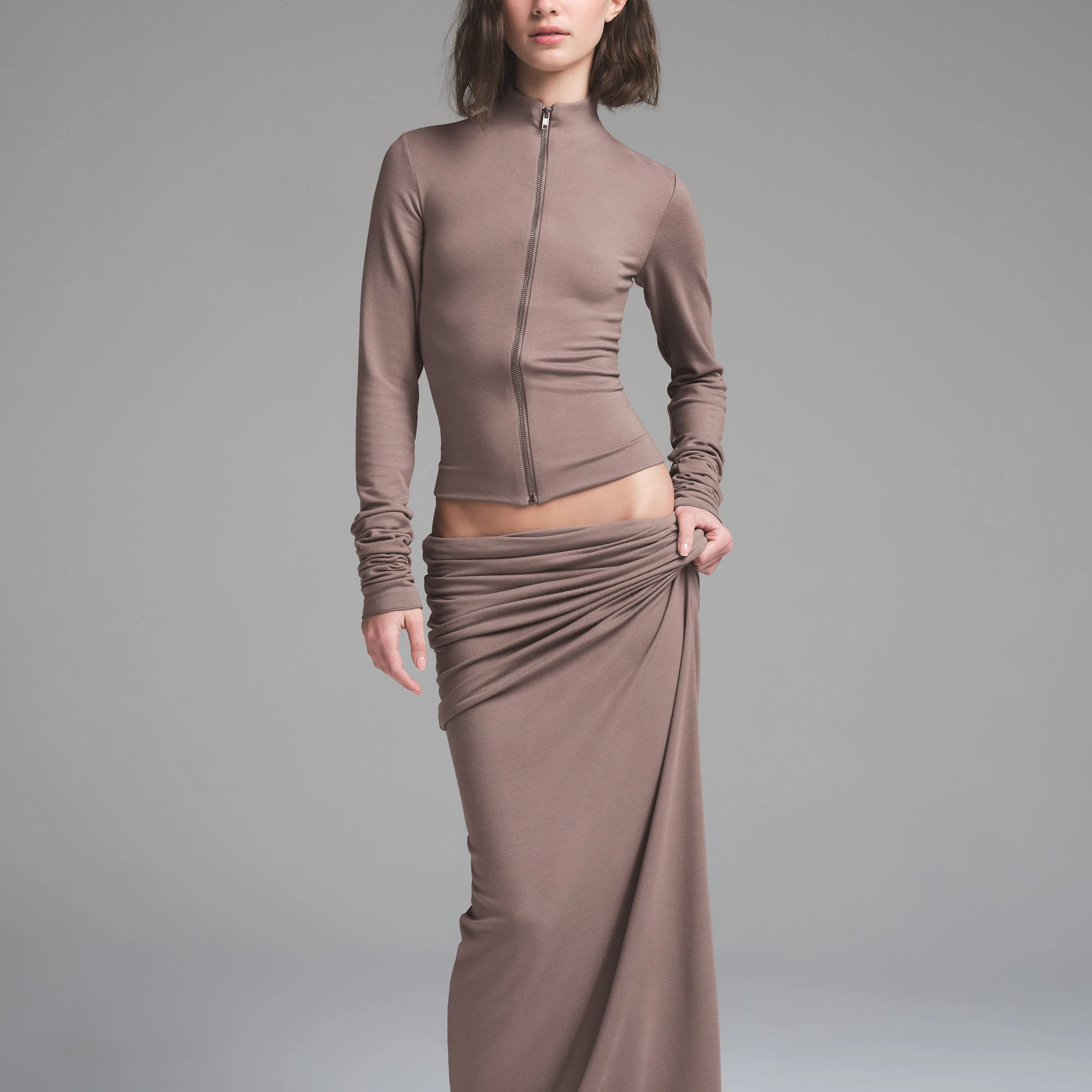 SKIMS CLOUD FOLDOVER SKIRT | AMETHYST ON A MODEL FRONT VIEW | FOCUS: 0.0, 1.0, 0.9