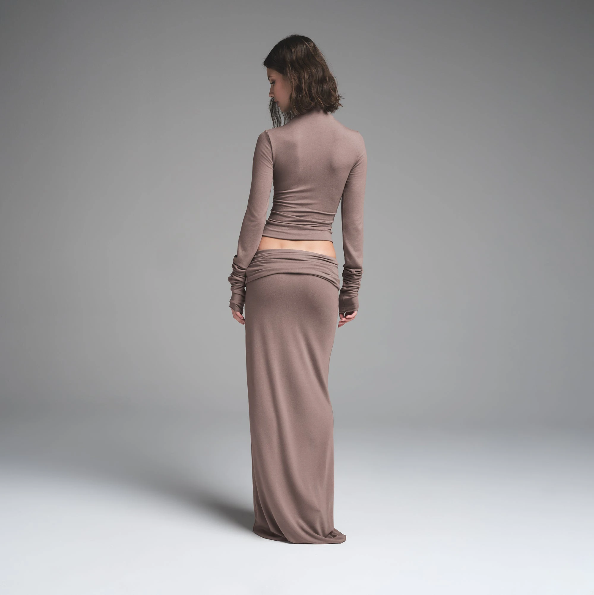 SKIMS CLOUD FOLDOVER SKIRT | AMETHYST ON A MODEL BACK VIEW | FOCUS: 0.0, 1.0, 0.9