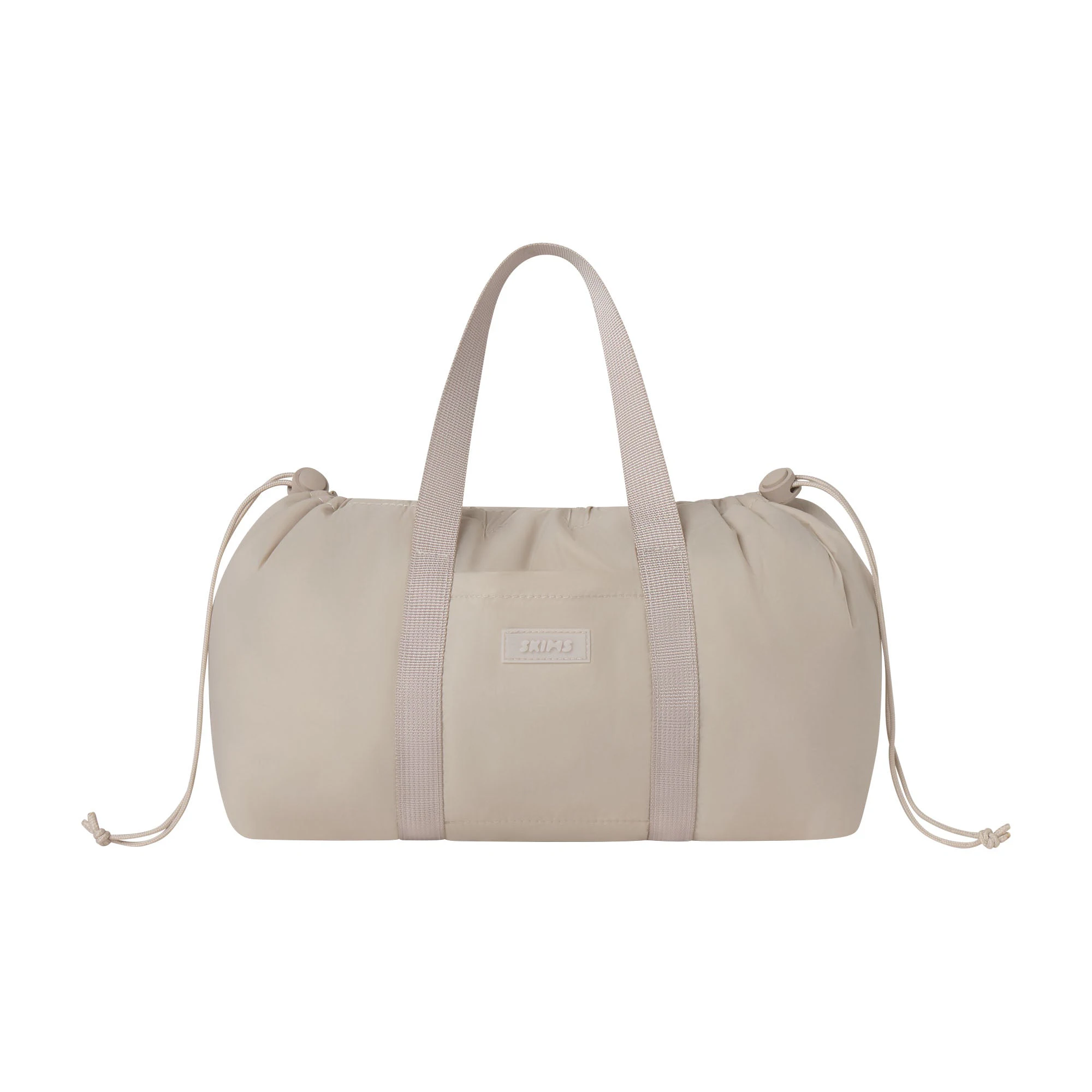 MINI NYLON DRAWSTRING BAG | STONE FLAT ON A WHITE BACKGROUND | FOCUS: 0.0, 1.0, 0.9