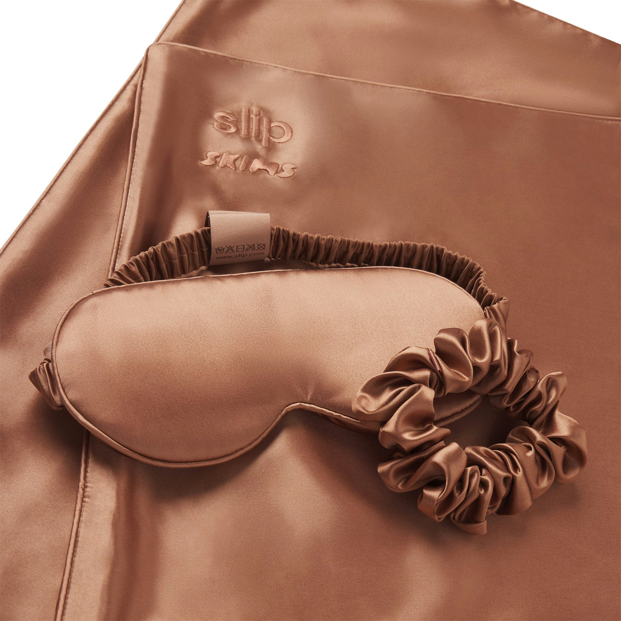 SLIP X SKIMS PURE SILK SIGNATURE GIFT SET | SIENNA FLAT ON A WHITE BACKGROUND | FLT