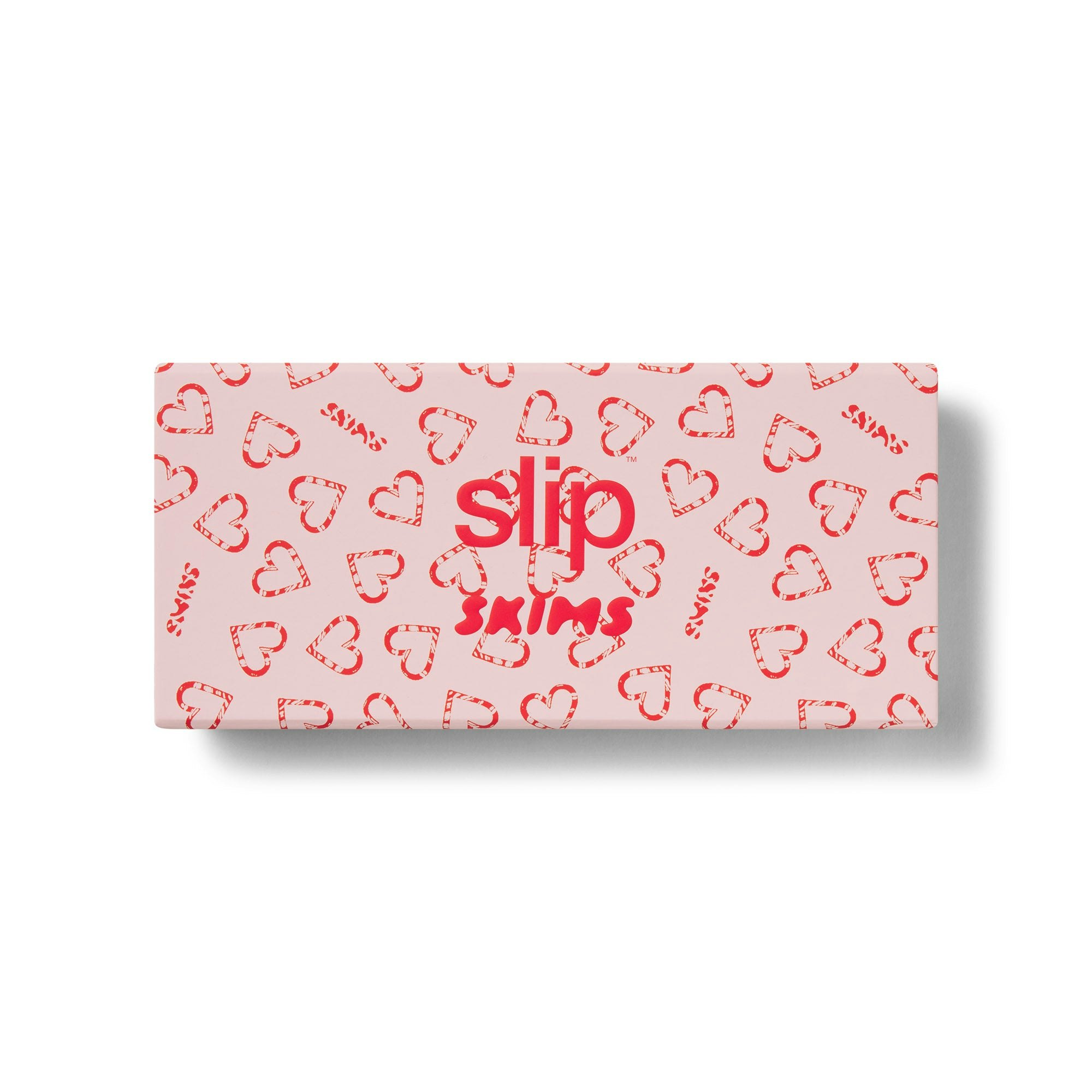 SLIP X SKIMS PURE SILK CONTOUR SLEEP MASK | CHERRY BLOSSOM CANDY HEART PRINT FLAT ON A WHITE BACKGROUND | FLT