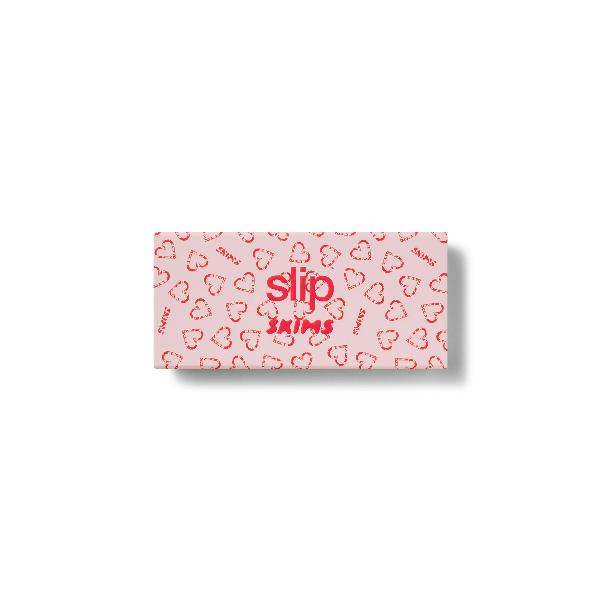 SLIP X SKIMS PURE SILK CONTOUR SLEEP MASK | CHERRY BLOSSOM CANDY HEART PRINT FLAT ON A WHITE BACKGROUND | FOCUS: 0.0, 1.0, 0.9