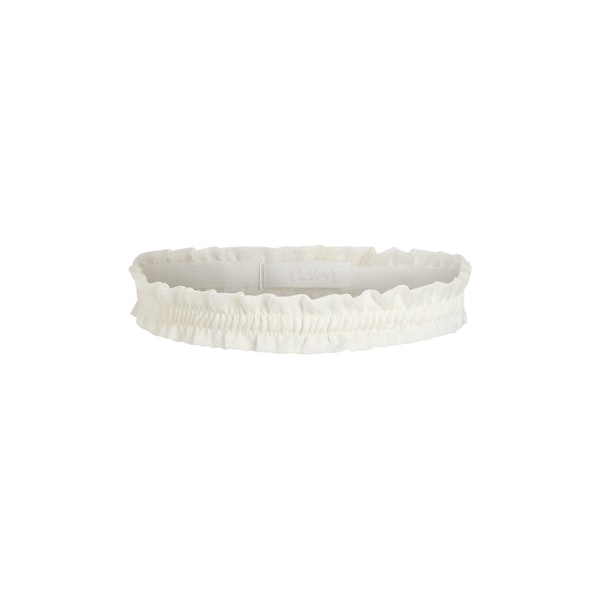 SKIMS ROMANCE SMOCKED GARTER | IVORY FLAT ON A WHITE BACKGROUND | FLT