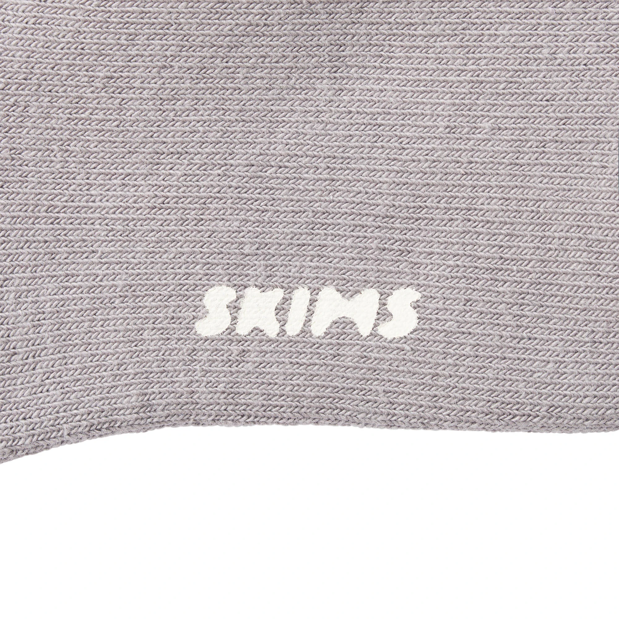 MENS LOUNGE SOCK LAYS FLAT ON A WHITE BACKGROUND