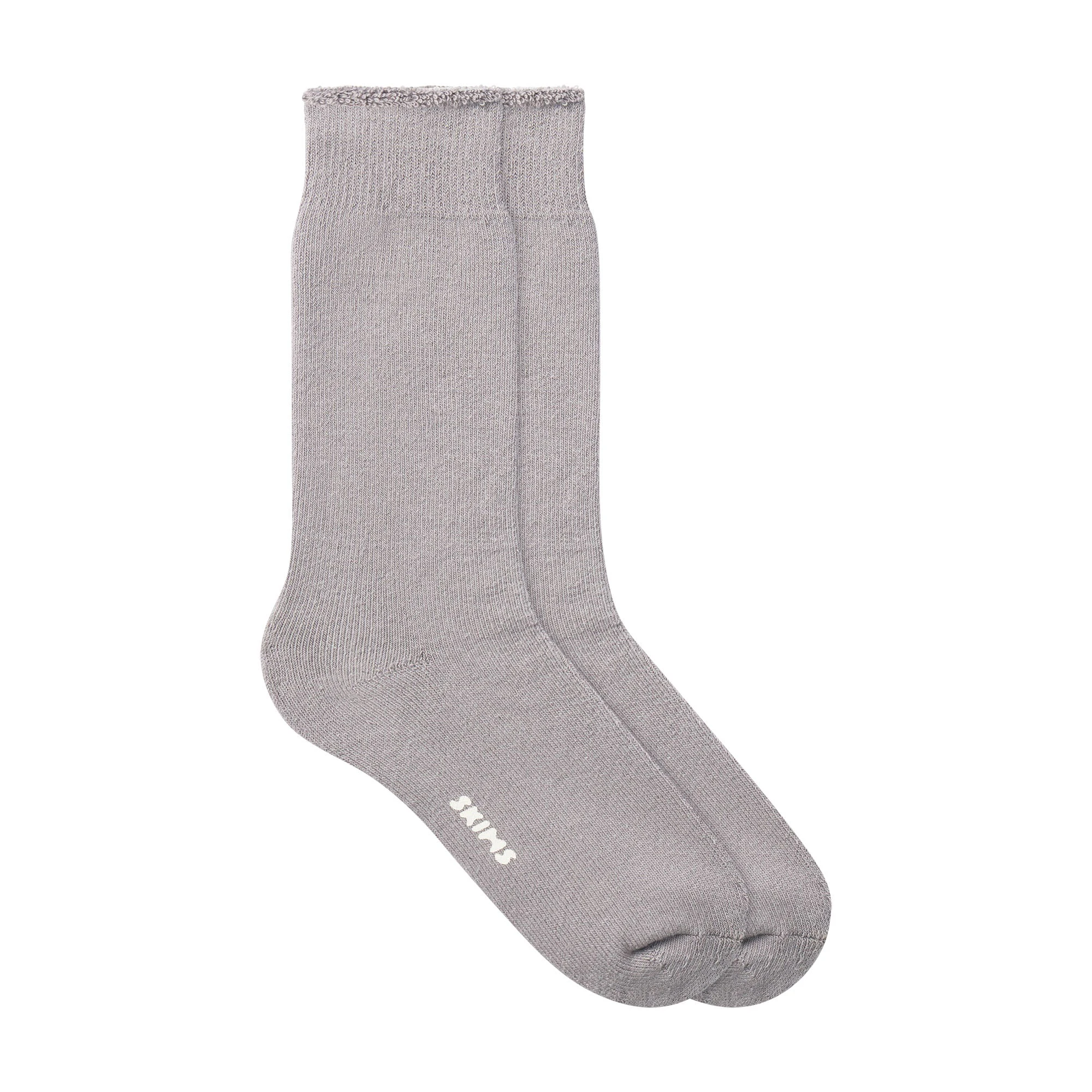 MENS LOUNGE SOCK LAYS FLAT ON A WHITE BACKGROUND