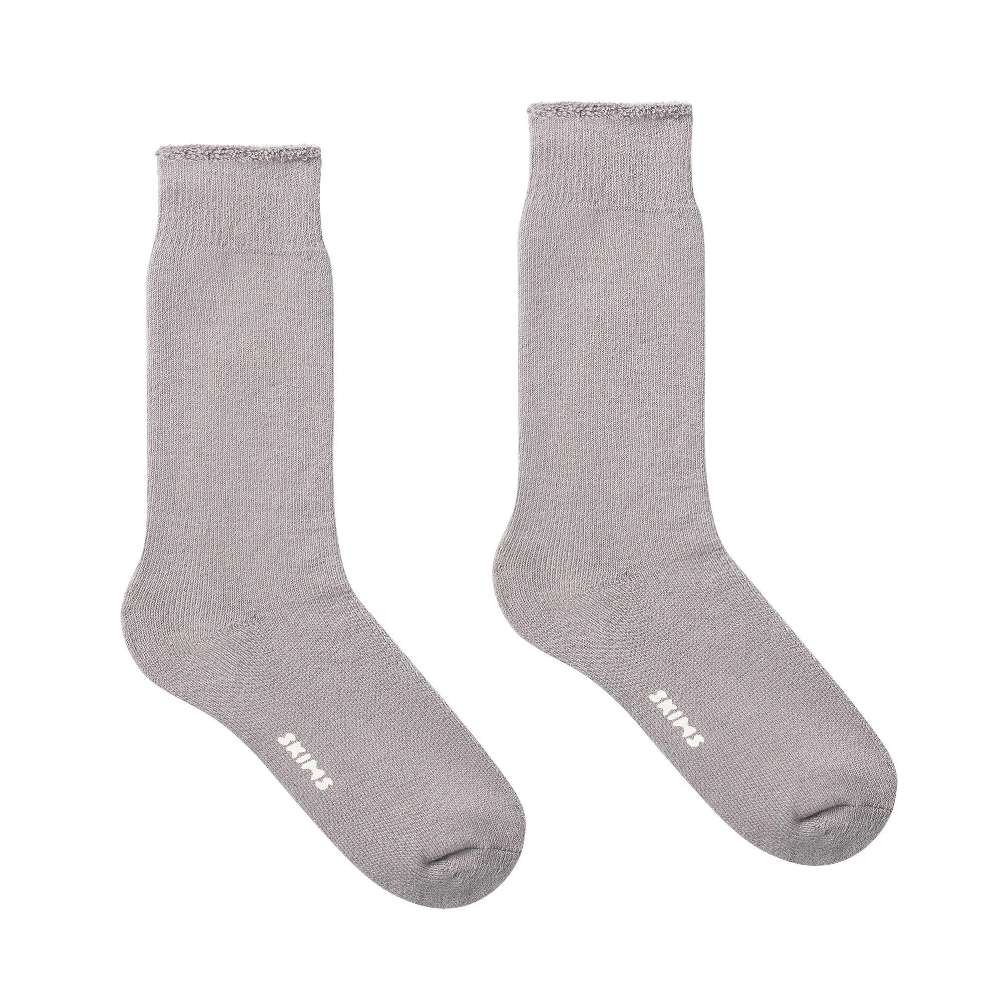 MENS LOUNGE SOCK LAYS FLAT ON A WHITE BACKGROUND
