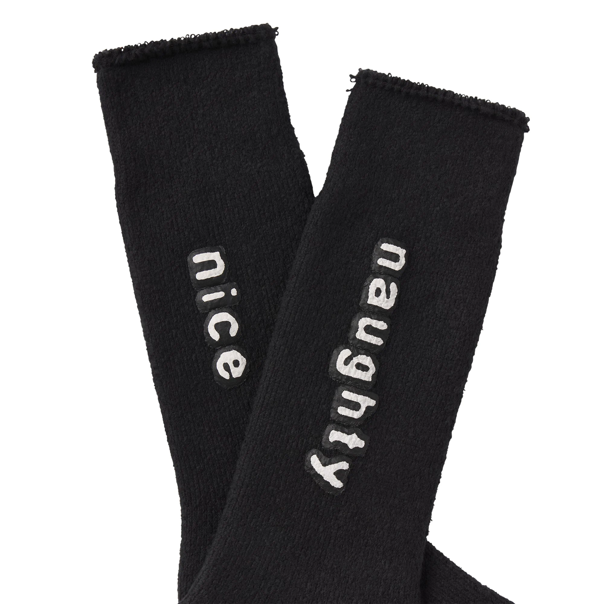 CACTUS PLANT FLEA MARKET X SKIMS PLUSH SOCK | ONYX FLAT ON A WHITE BACKGROUND