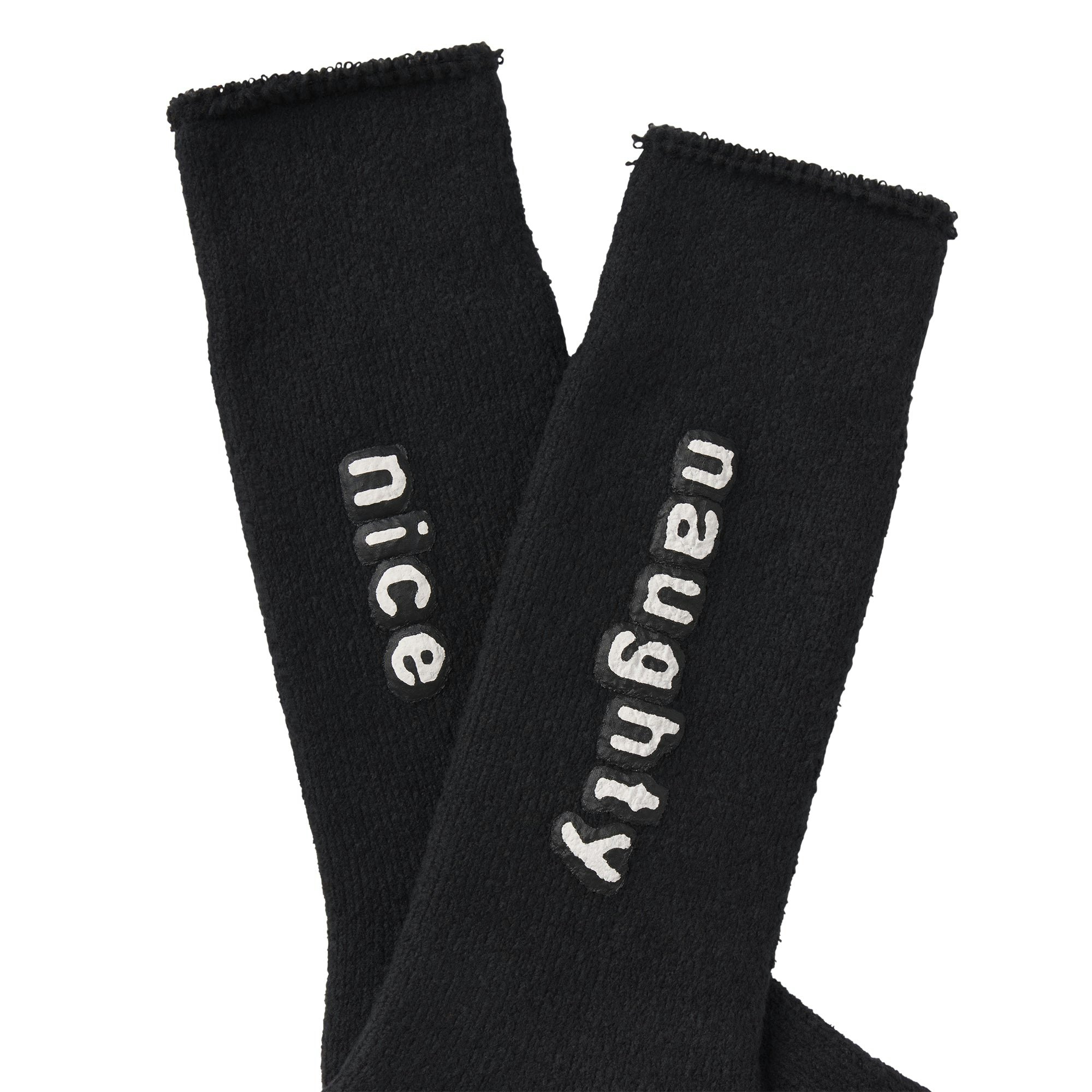 CACTUS PLANT FLEA MARKET X SKIMS PLUSH SOCK | ONYX FLAT ON A WHITE BACKGROUND