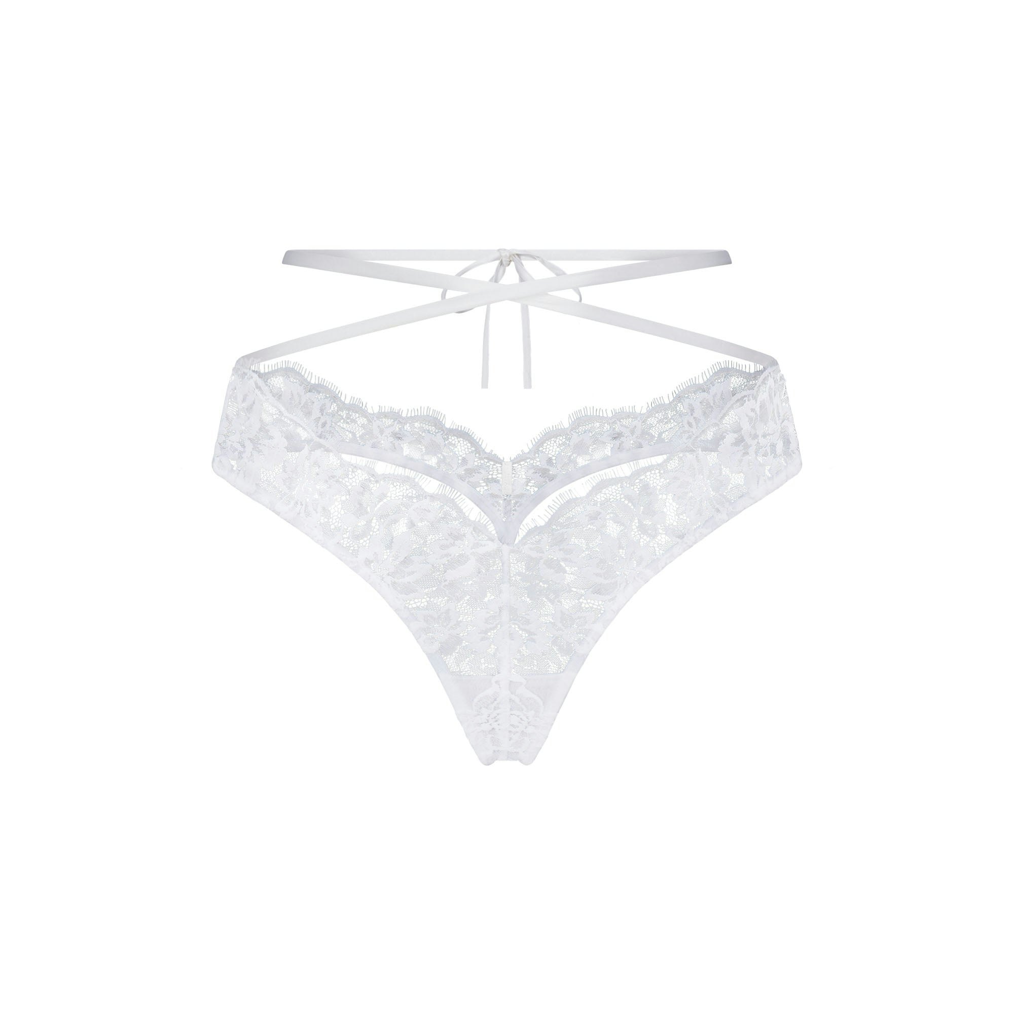SKIMS LACE MICRO BUTTERFLY THONG | SNOW FLAT ON A WHITE BACKGROUND | FLT