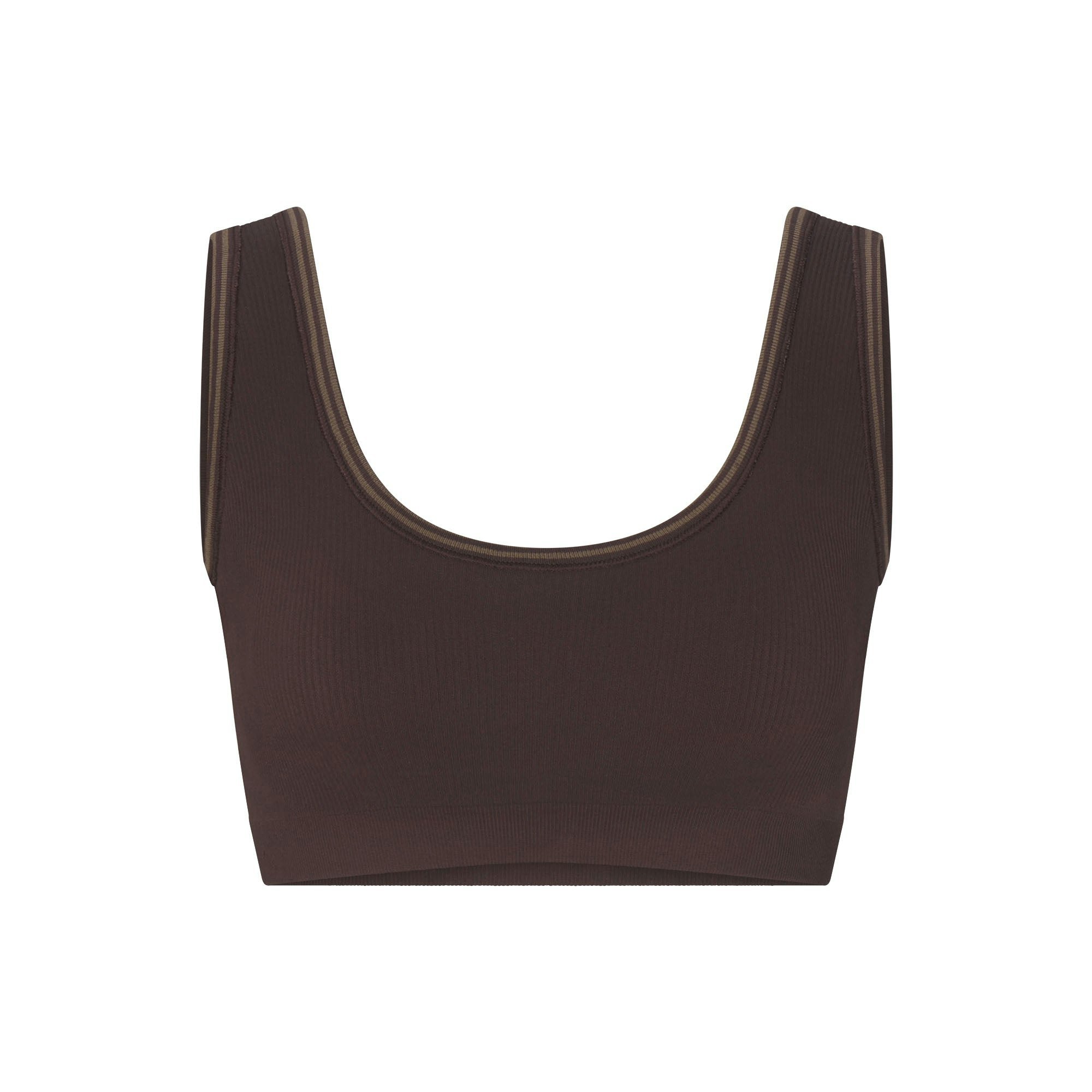 NikeSKIMS RIBBED SEAMLESS SCOOP BRA | PHOENIX/TRUFFLE FLAT ON A WHITE BACKGROUND | FLT