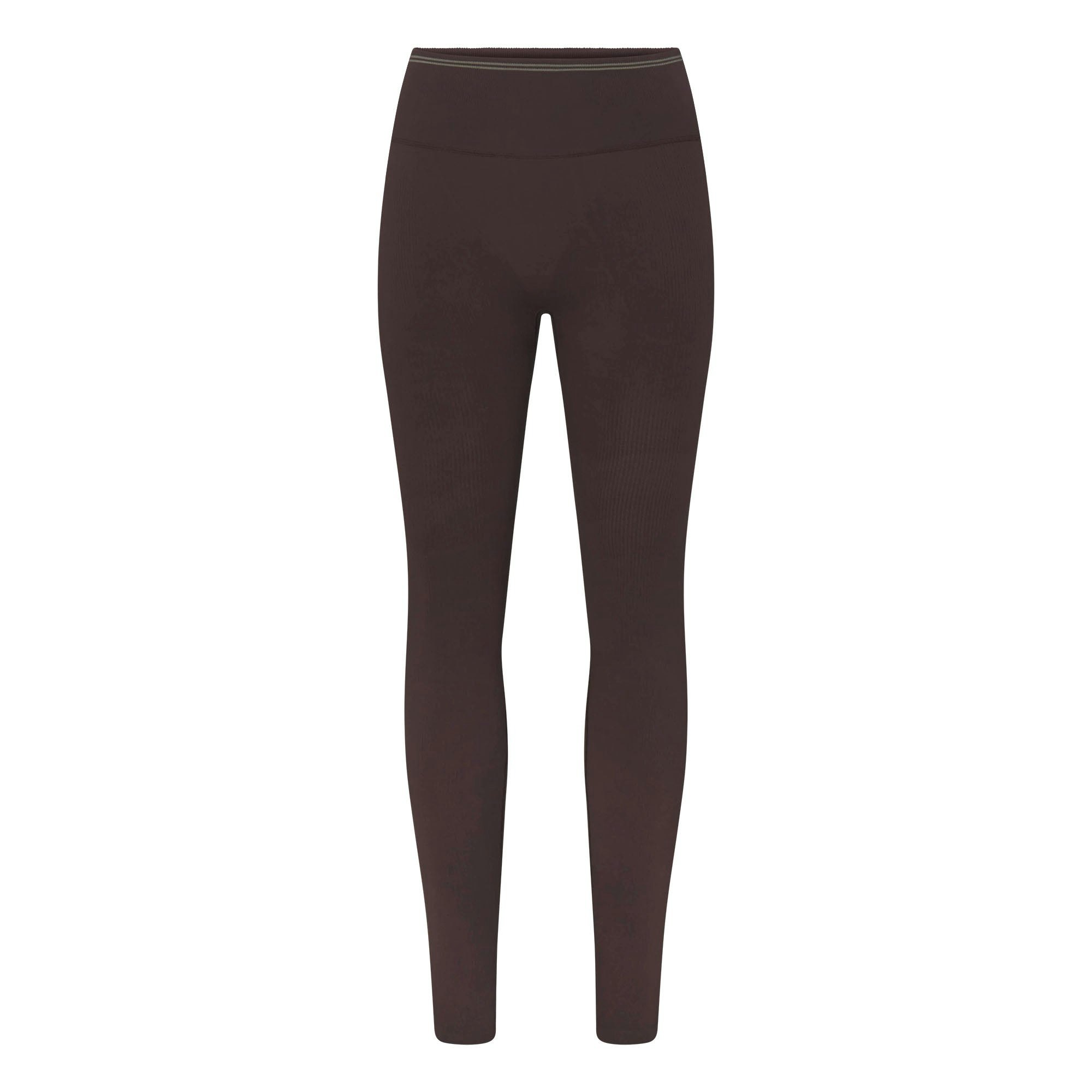 NikeSKIMS RIBBED SEAMLESS 26" LEGGING | PHOENIX/TRUFFLE FLAT ON A WHITE BACKGROUND | FLT