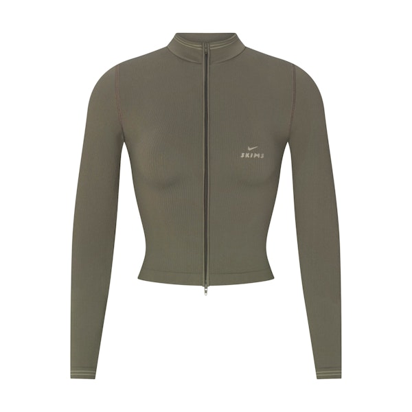 NikeSKIMS RIBBED SEAMLESS ZIP UP CROP JACKET | DUSTY OAKMOSS FLAT ON A WHITE BACKGROUND | FLT