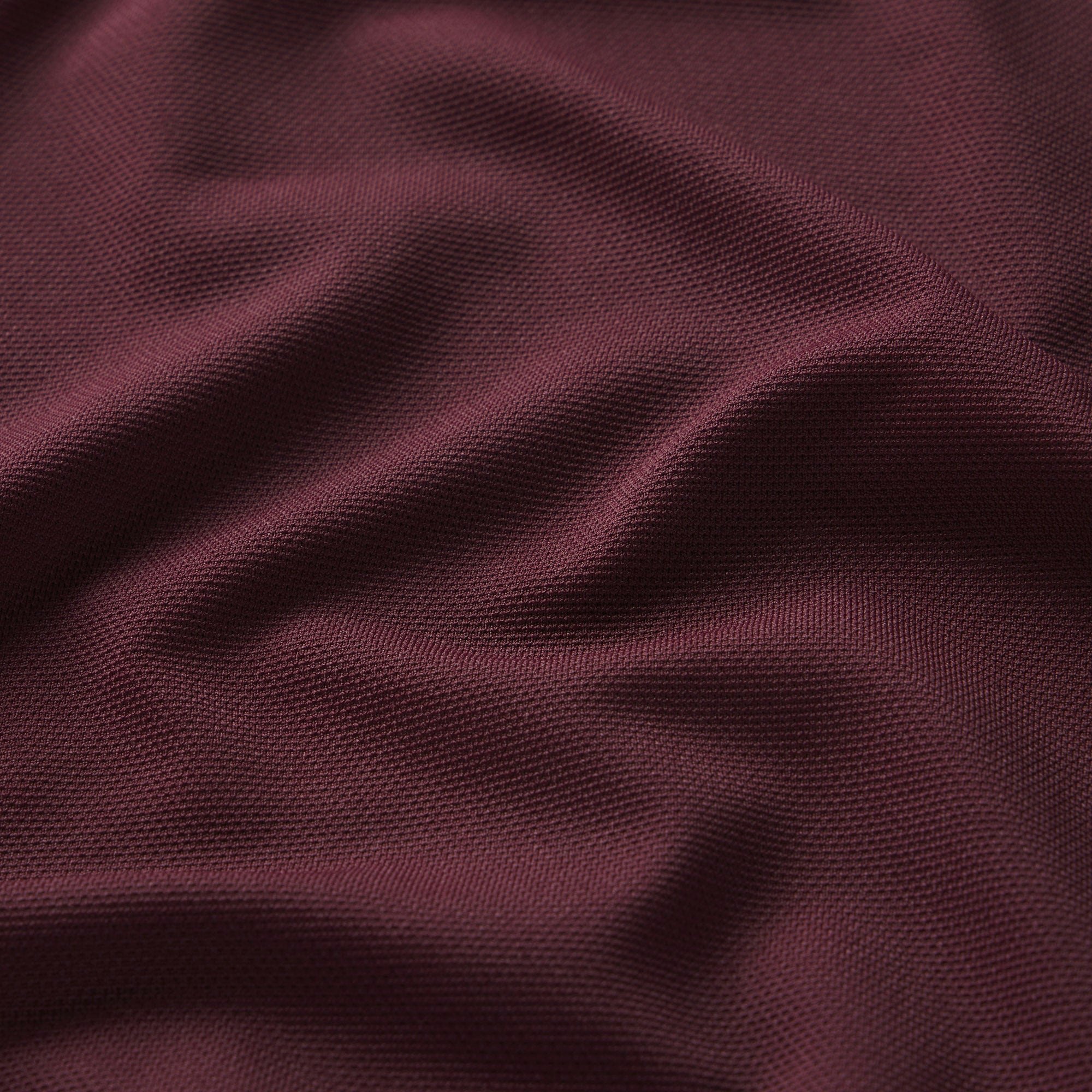 NikeSKIMS AIRY LONG SLEEVE CREW NECK TOP | CURRANT ON A MODEL SIDE VIEW @ | FOCUS: 0.0, 1.0, 0.9