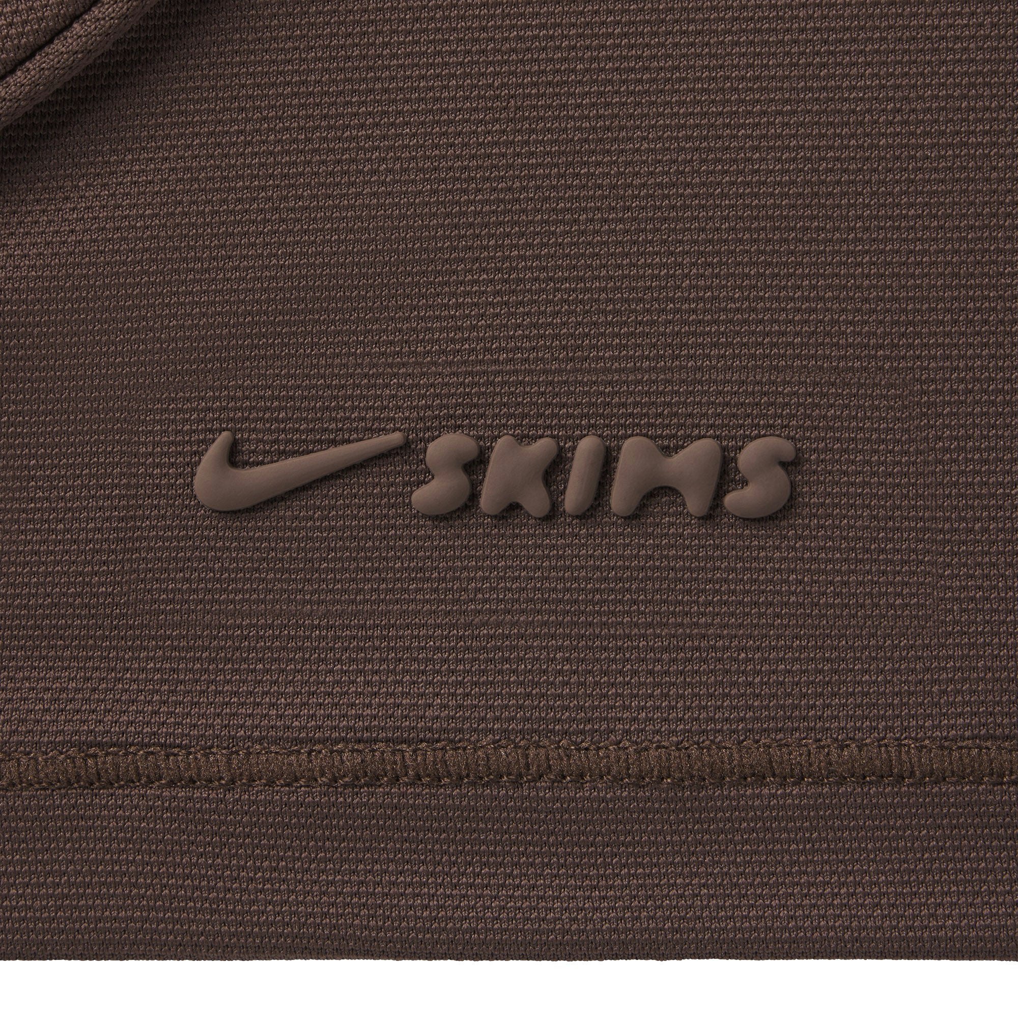 NikeSKIMS AIRY RELAXED SHORT | DARK SEPIA ON A MODEL SIDE VIEW @ | FOCUS: 0.0, 1.0, 0.9