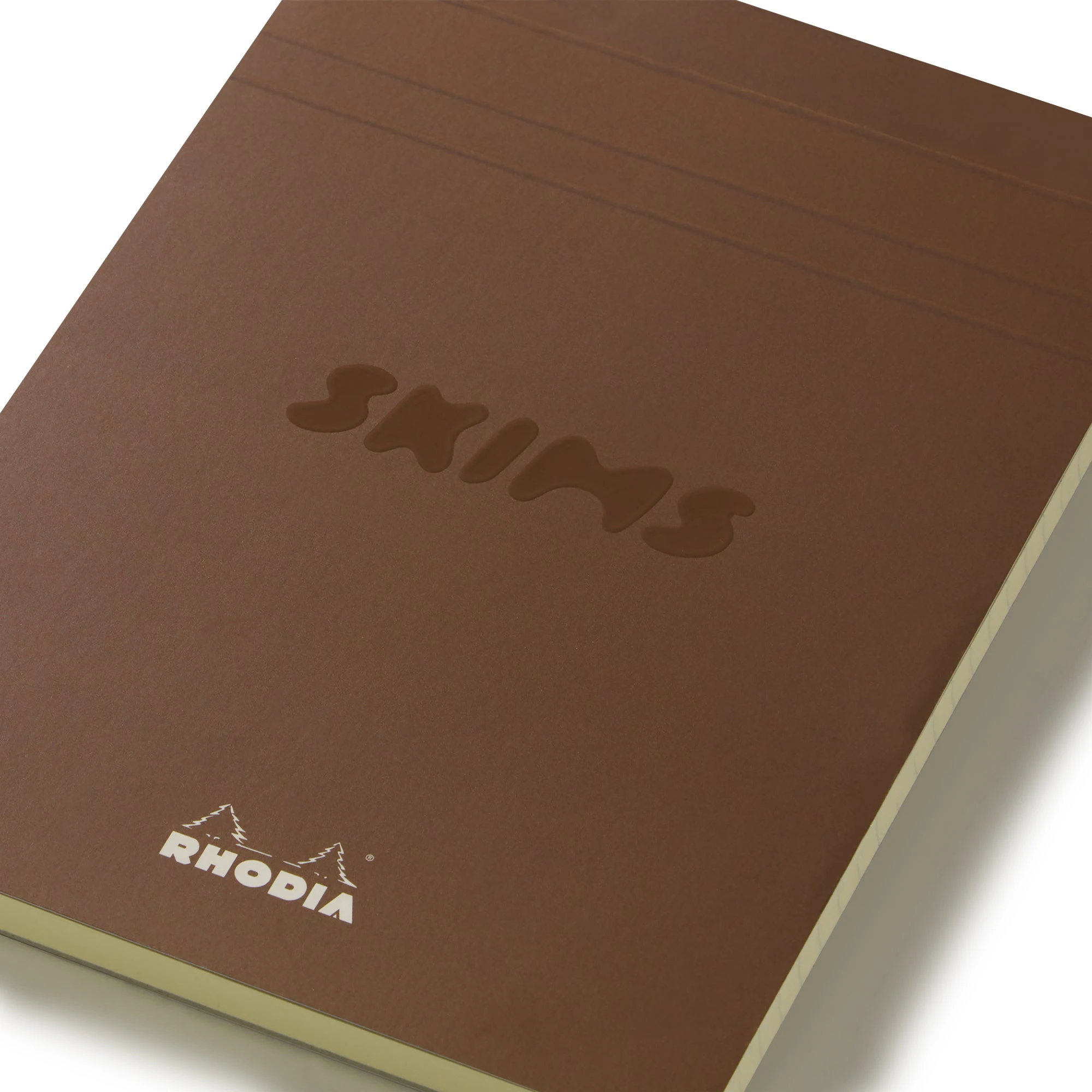 RHODIA X SKIMS NOTEPAD SET | NEUTRAL MULTI & LAYS FLAT ON A WHITE BACKGROUND | FLT