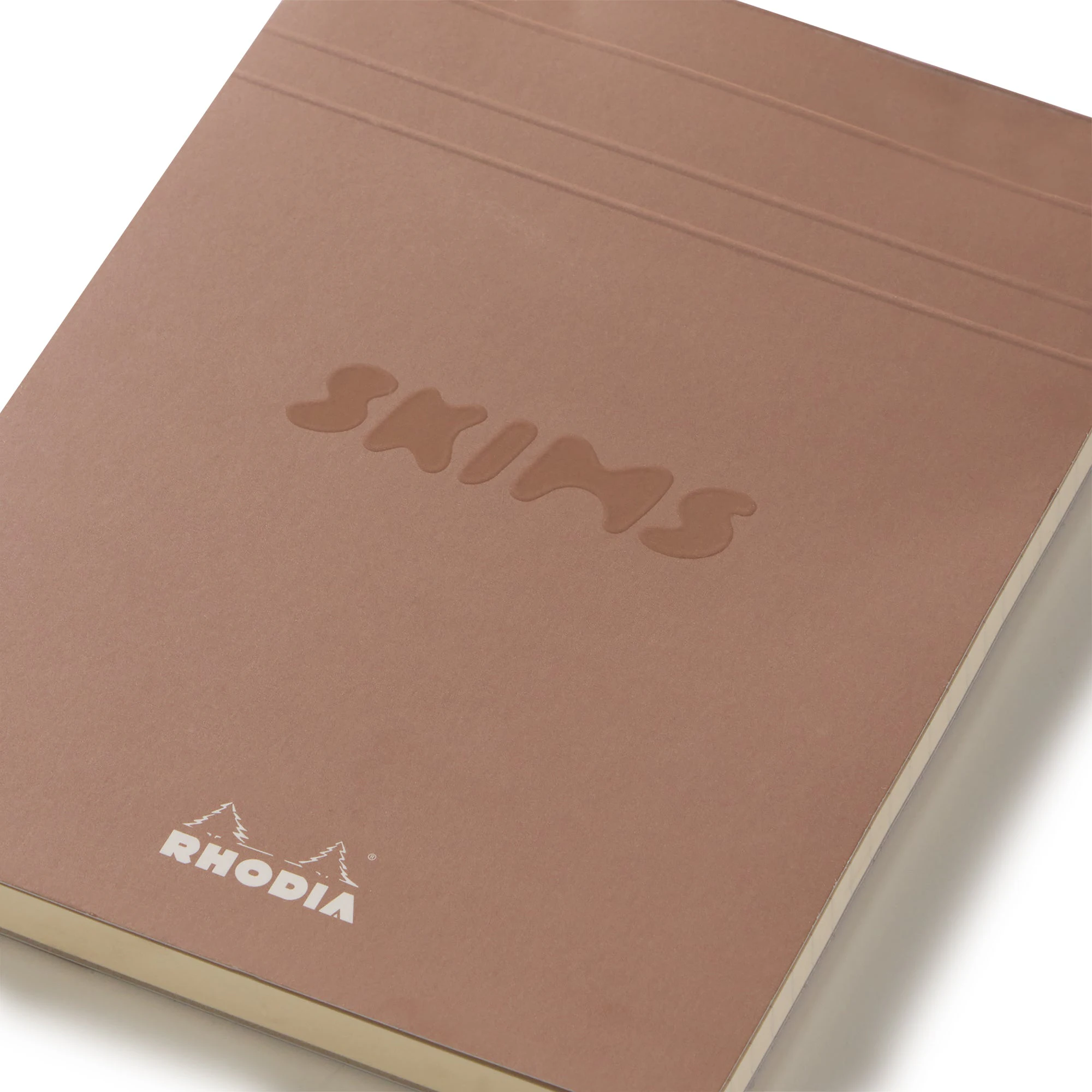 RHODIA X SKIMS NOTEPAD SET | NEUTRAL MULTI & LAYS FLAT ON A WHITE BACKGROUND | FLT