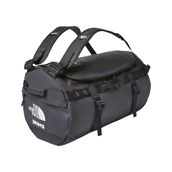 THE NORTH FACE X SKIMS SMALL BASE CAMP DUFFLE BAG | GUNMETAL FLAT ON A WHITE BACKGROUND | FLT