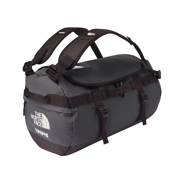 THE NORTH FACE X SKIMS SMALL BASE CAMP DUFFLE BAG | PHOENIX FLAT ON A WHITE BACKGROUND | FLT