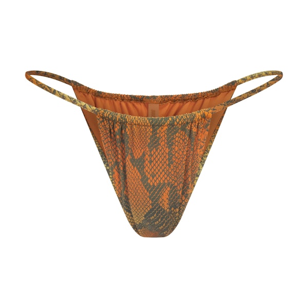 SIGNATURE SWIM STRING BIKINI BOTTOM | FOREST OMBRE SNAKE LAYS FLAT ON A WHITE BACKGROUND | FLT