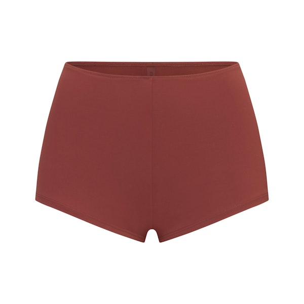 SIGNATURE SWIM SHORT BIKINI BOTTOM | HENNA LAYS FLAT ON A WHITE BACKGROUND | FLT 