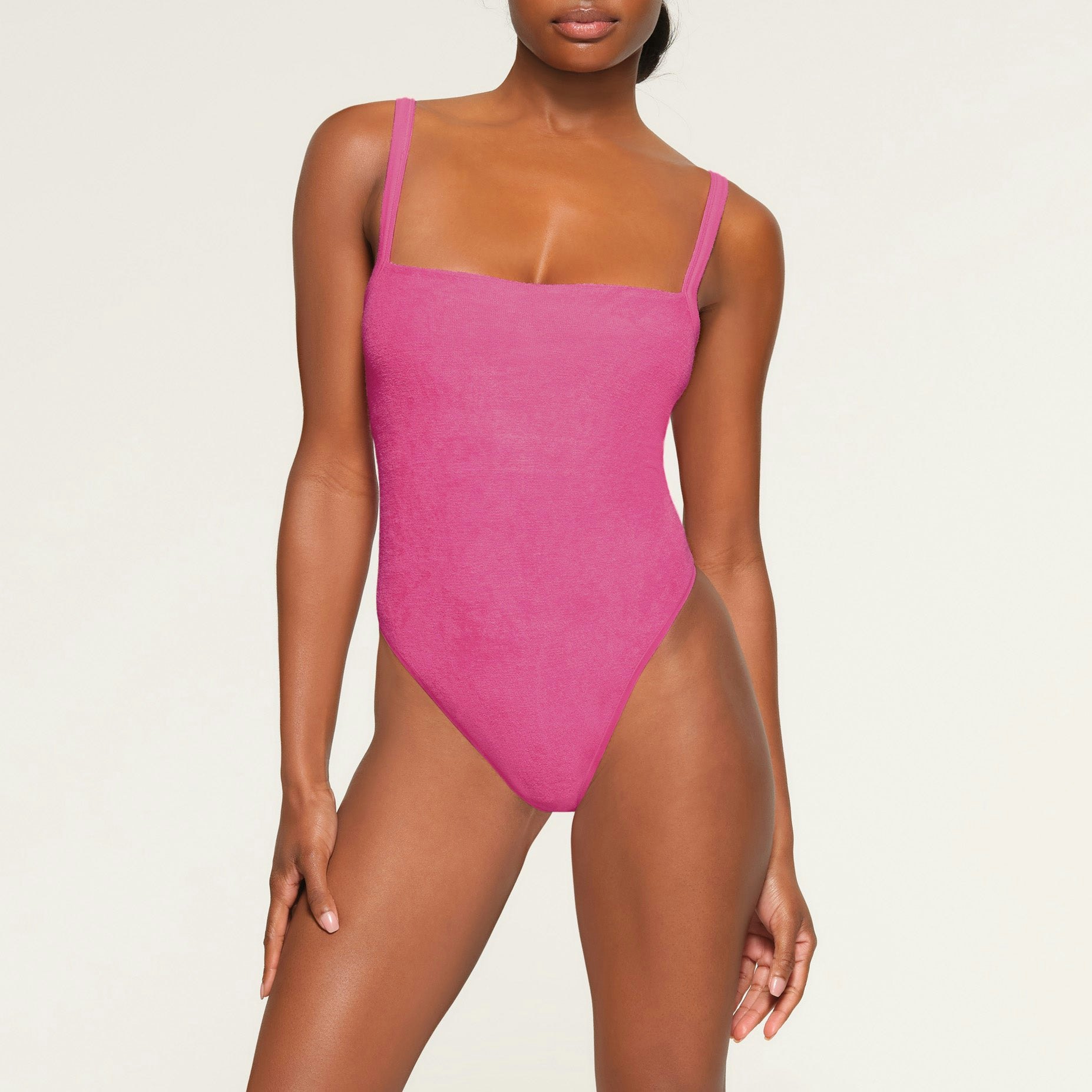 TERRY LOUNGE SEAMLESS BODYSUIT WORN BY A MODEL IN FRONT VIEW