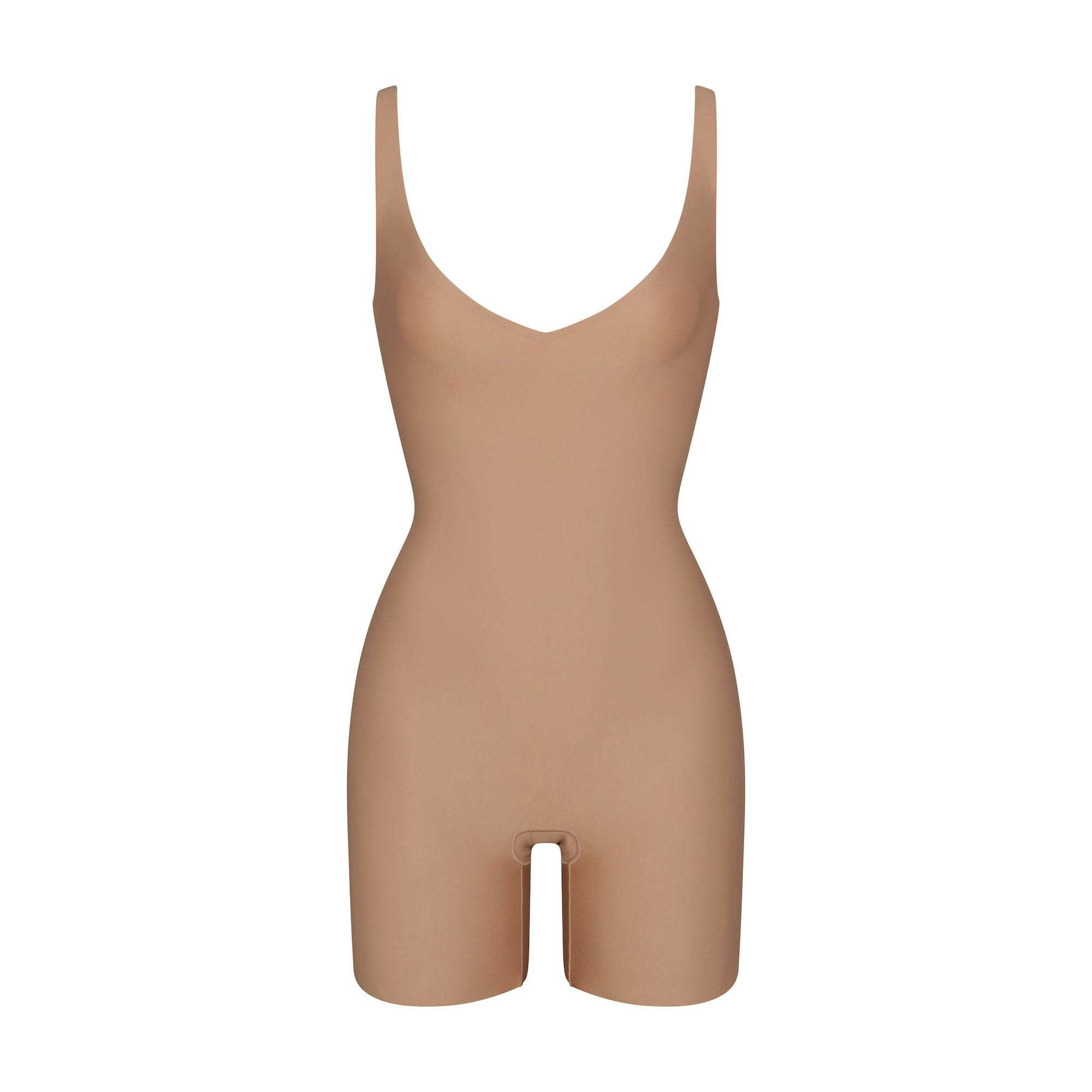 SKIMS BODY UNLINED PLUNGE MID THIGH BODYSUIT | SIENNA (SHAPEWEAR BODYSUITS, SHAPEWEAR) LAYS FLAT ON A WHITE BACKGROUND | FLT