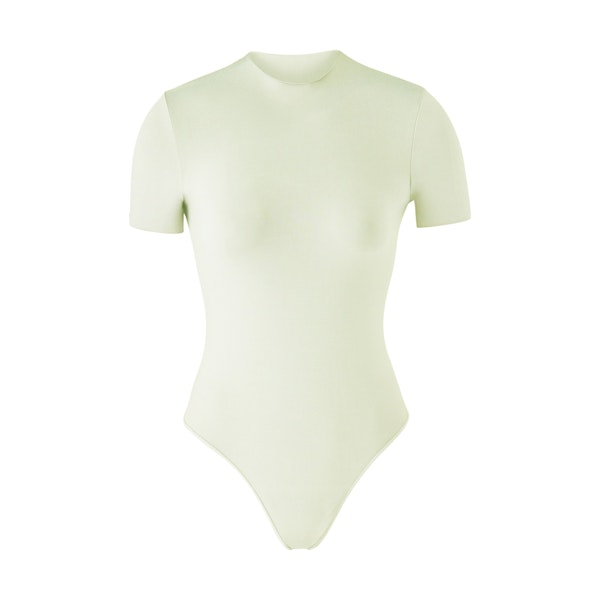 ESSENTIAL T-SHIRT BODYSUIT | PISTACHIO (BODYSUITS) ON A WHITE BACKGROUND