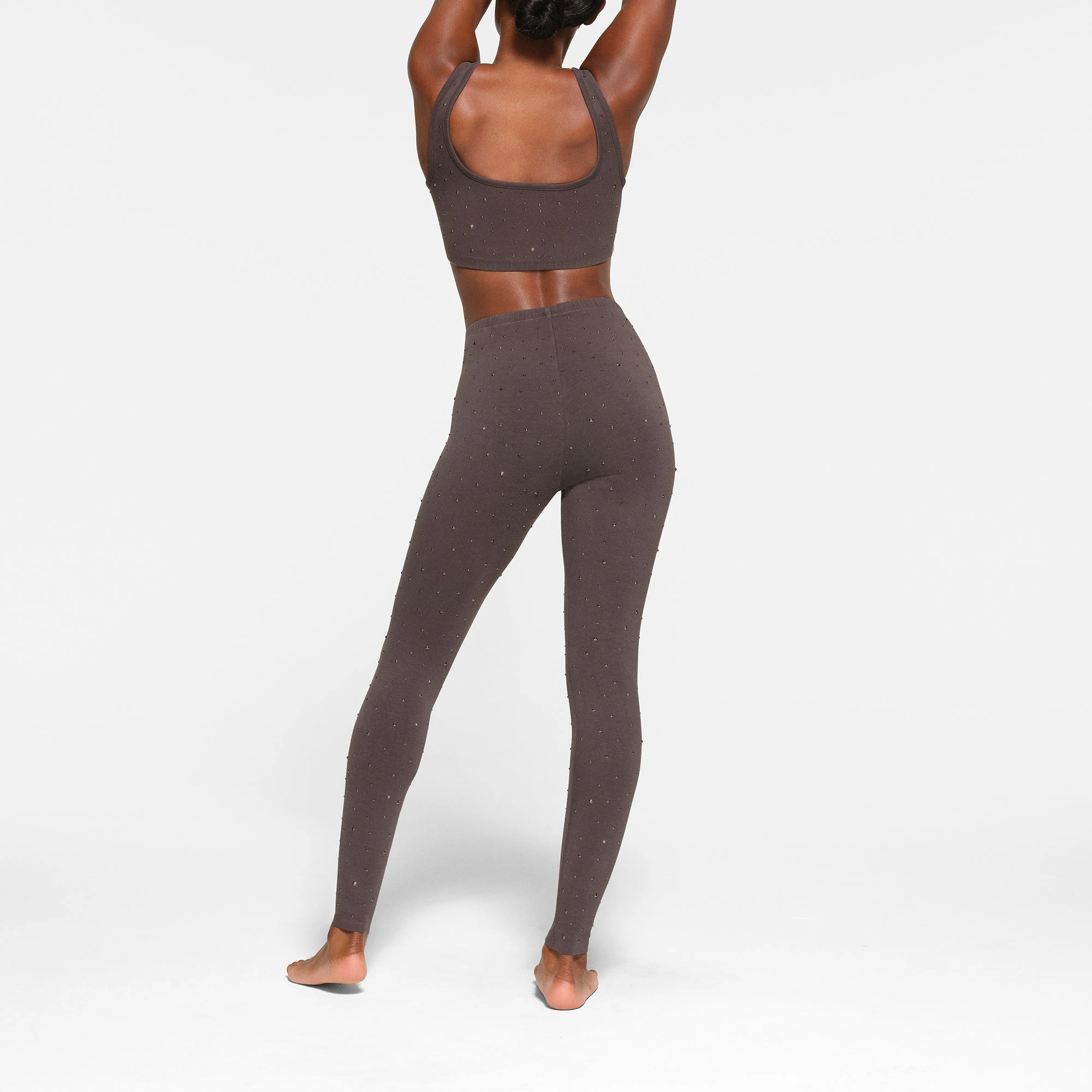 OUTDOOR RHINESTONE LEGGING WORN BY A MODEL IN BACK VIEW