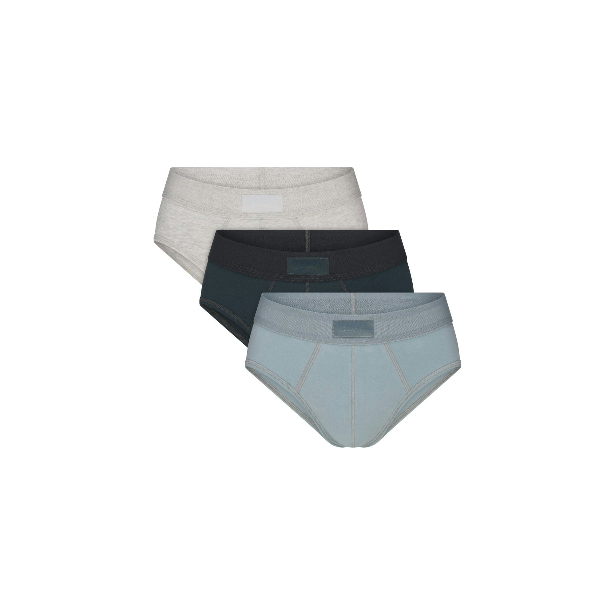 SKIMS COTTON MENS BRIEF 3-PACK | VERDANT MULTI FLAT ON A WHITE BACKGROUND | FLT @ | FOCUS: 0.0, 1.0, 0.9