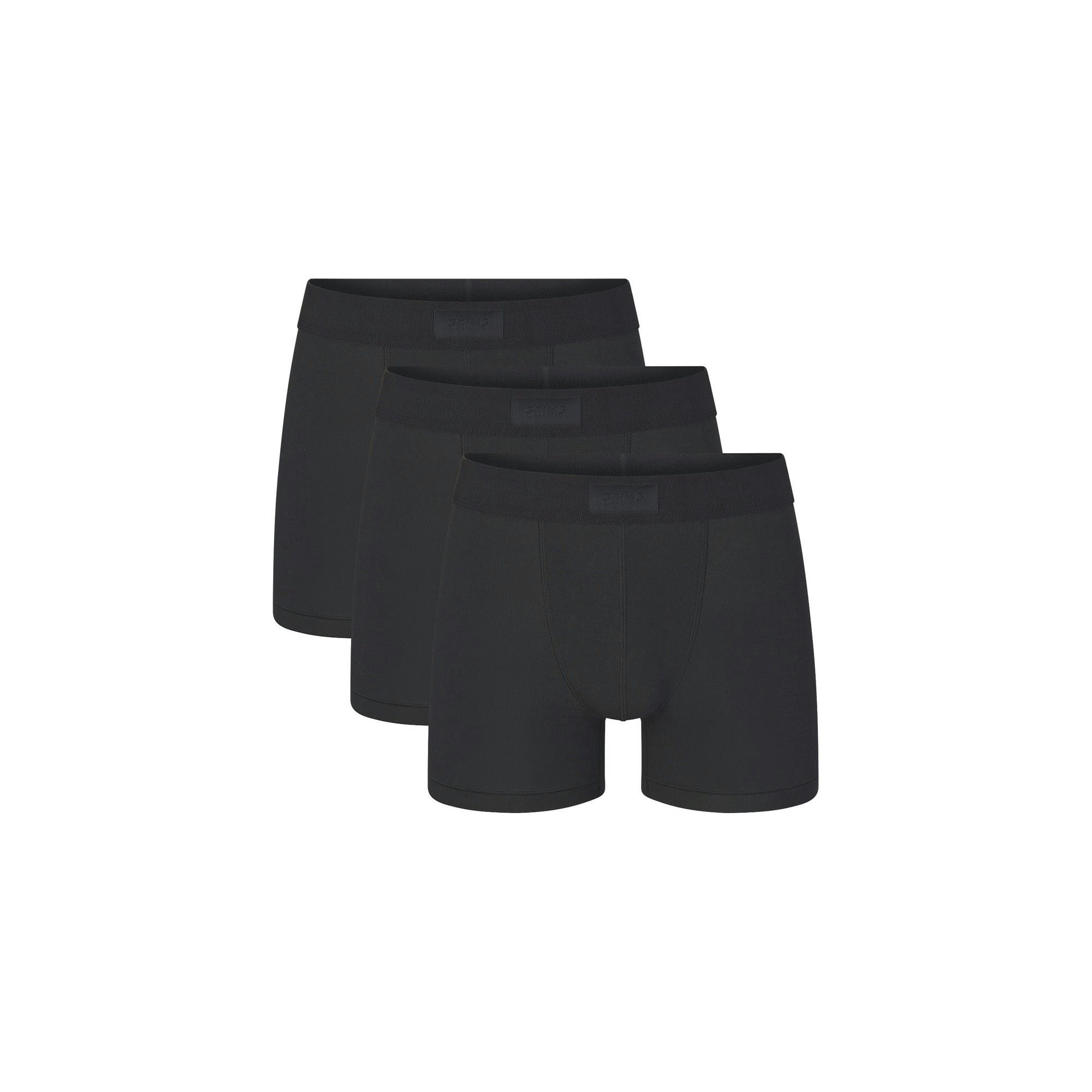 SKIMS COTTON MENS 3" BOXER BRIEF 3-PACK | ONYX (MENS BOXERS, MENS UNDERWEAR) LAYS FLAT ON A WHITE BACKGROUND | FLT  | FOCUS: 0.0, 1.0, 0.9