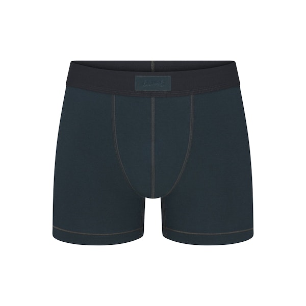 SKIMS COTTON MENS 3" BOXER BRIEF | VERDANT FLAT ON A WHITE BACKGROUND | FLT