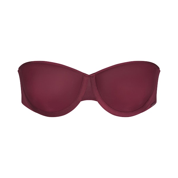 WEIGHTLESS STRAPLESS BRA | WINE (STRAPLESS BRAS) LAYS FLAT ON A WHITE BACKGROUND | FLT