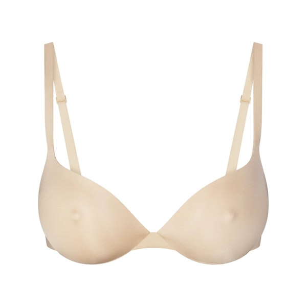 SKIMS ULTIMATE BRA NIPPLE PUSH-UP BRA | SAND (PLUNGE BRAS) LAYS FLAT ON A WHITE BACKGROUND | FLT