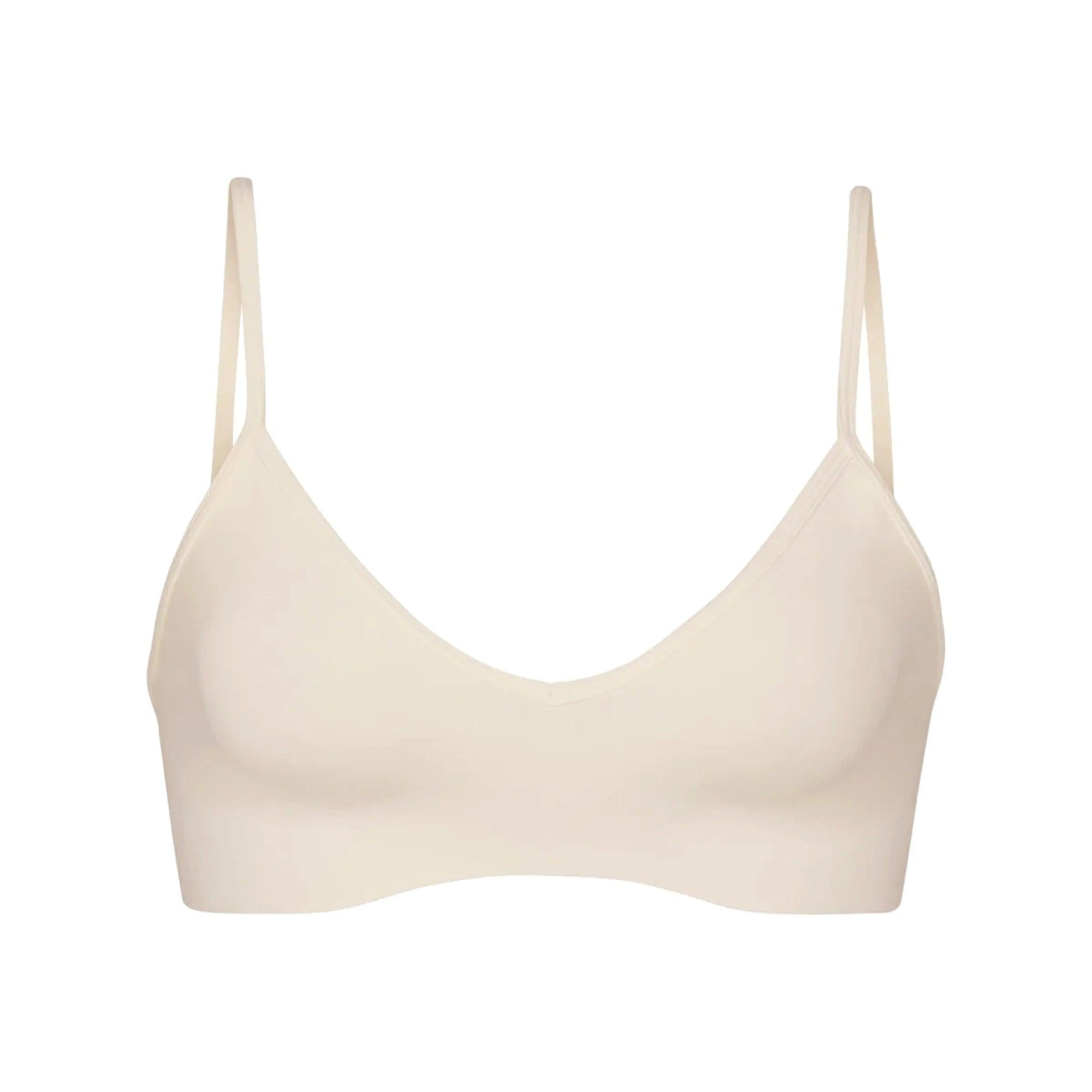 SOFT SMOOTHING SEAMLESS BRALETTE | SAND (TRIANGLE BRALETTES) LAYS FLAT ON A WHITE BACKGROUND | FLT
