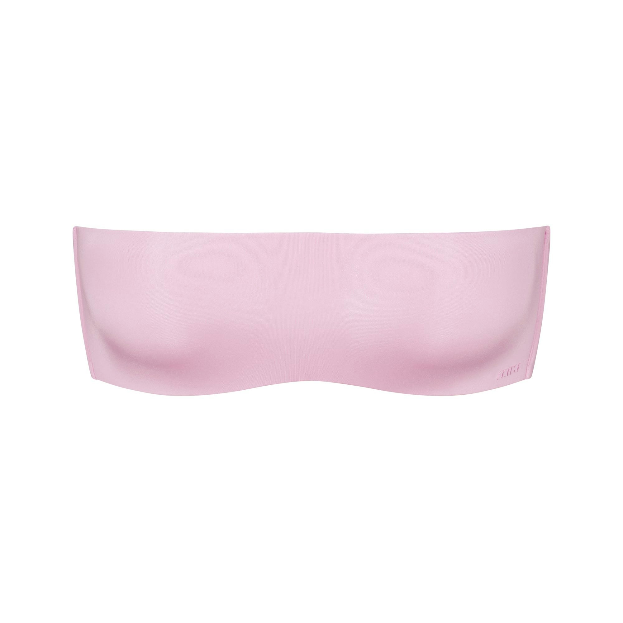 WIRELESS FORM STRAPLESS BRA | BABY PINK (STRAPLESS BRAS) LAYS FLAT ON A WHITE BACKGROUND | FLT