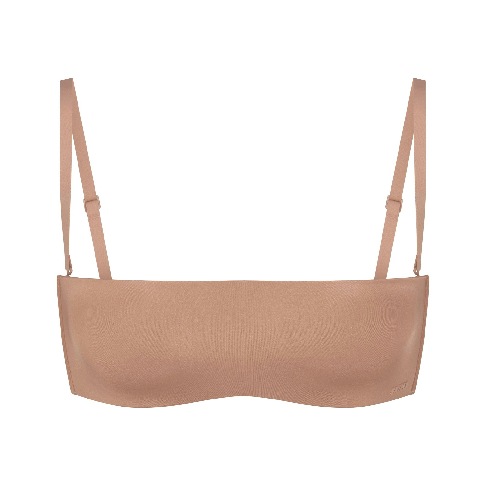 WIRELESS FORM STRAPLESS BRA LAYS FLAT ON A WHITE BACKGROUND | FLT