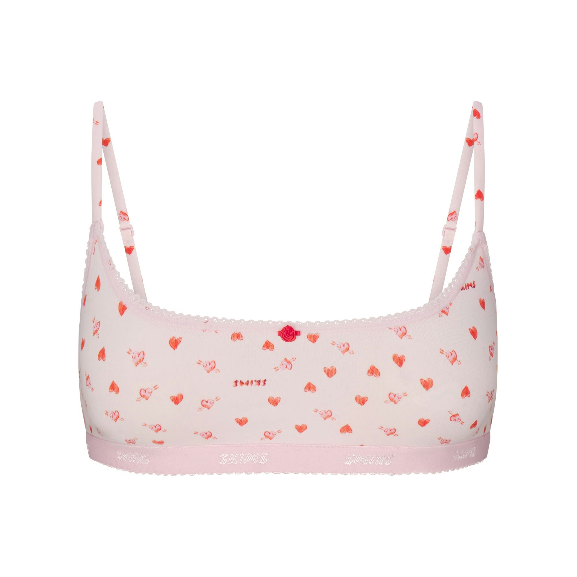 LIGHTWEIGHT COTTON LOGO PICOT SCOOP BRALETTE | BABY PINK ARROWED HEARTS LAYS FLAT ON A WHITE BACKGROUND | FLT 
