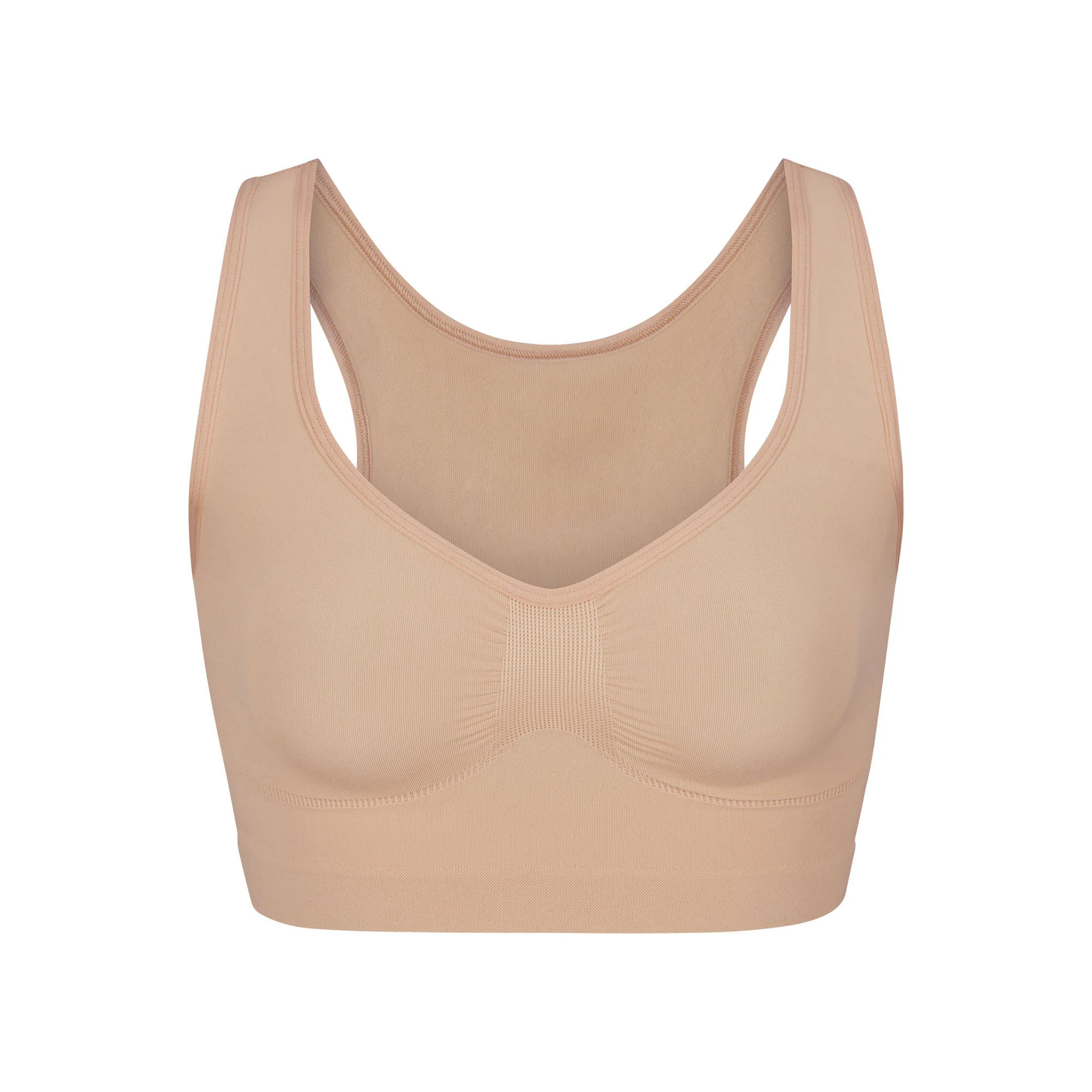 SEAMLESS SCULPT SCOOP PLUNGE BRALETTE LAYS FLAT ON A WHITE BACKGROUND